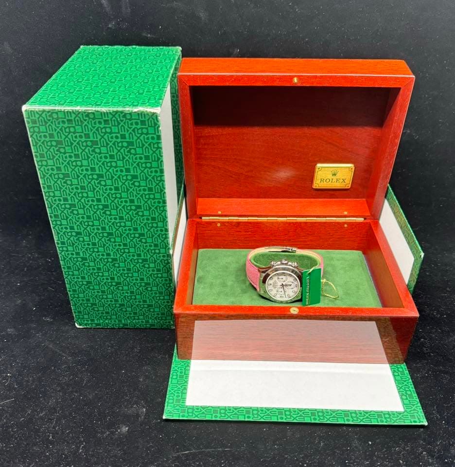 May be an image of wrist watch and text that says 'ROLEX'