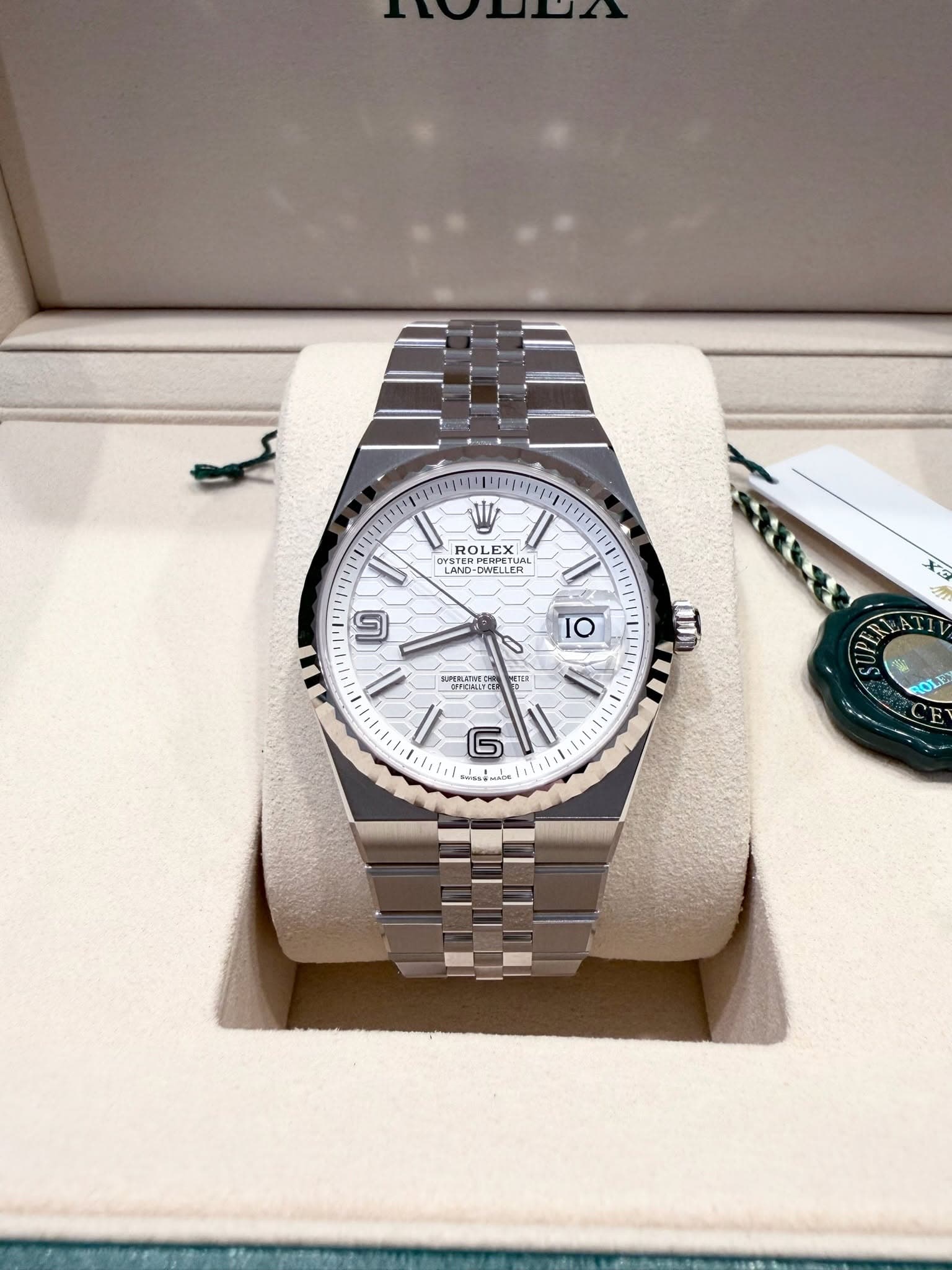 May be an image of wrist watch and text