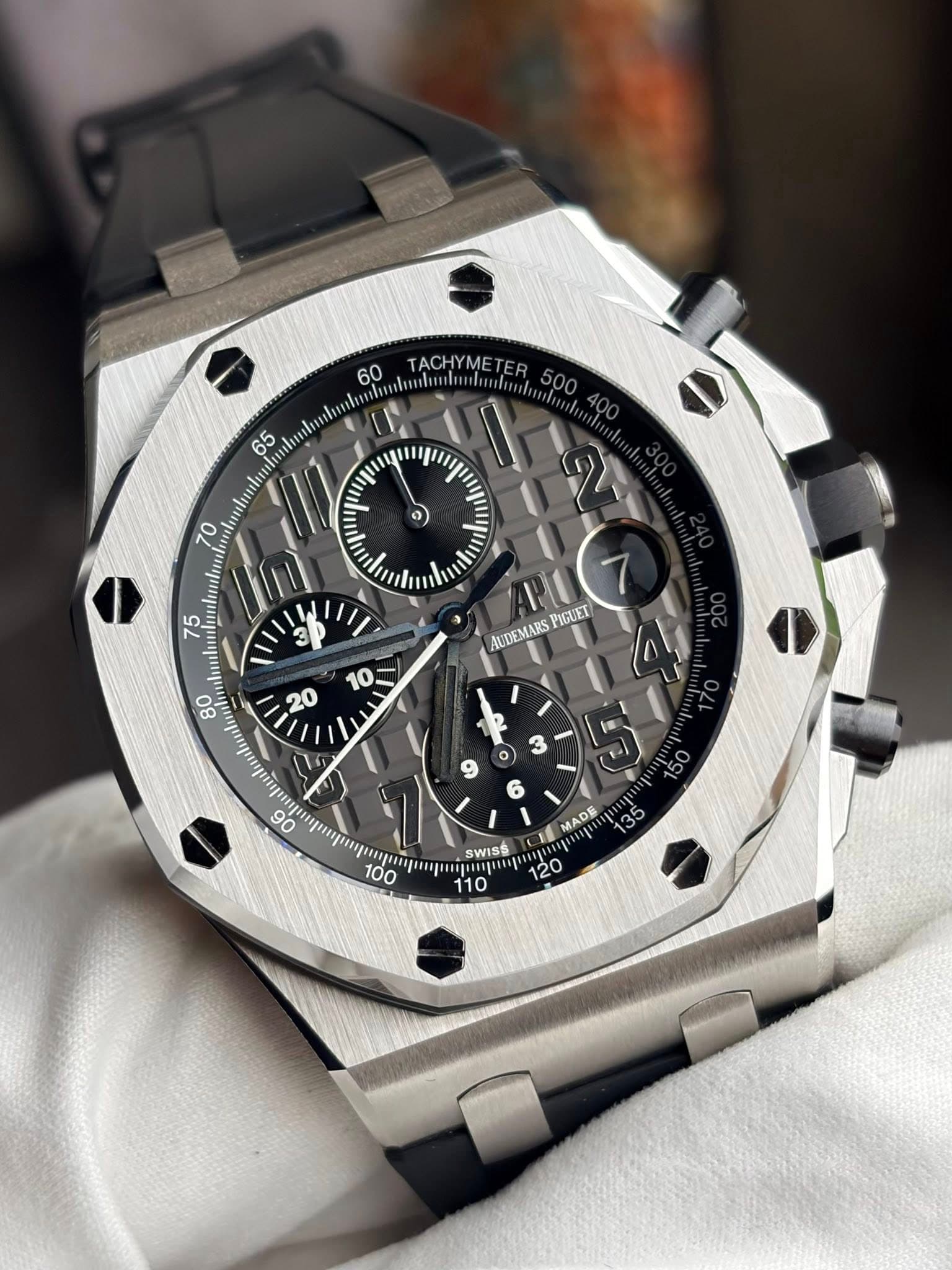 May be an image of wrist watch and text
