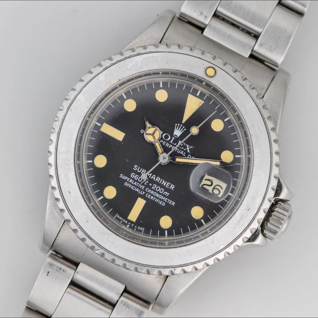 May be an image of wrist watch and text that says 'O 0 PERPETUA شم ERRL OL TUAL X SUP SUPE OERLATIVE SUPERLASIC UPERLATIVE 660ft ርናቅህ OFFICIALLY MARINER EMARINER 200m 200m…