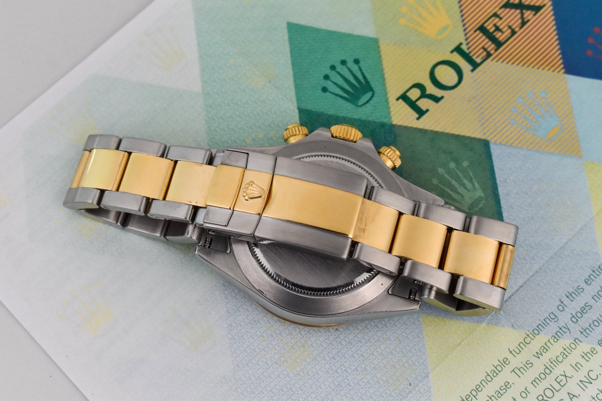 May be an image of wrist watch and text that says 'Uy ROLE 空 RO KUII MNT ብ ofthisentin of this enti functioning does thro pendable nase. nase.Thiswa the This warranty modification…