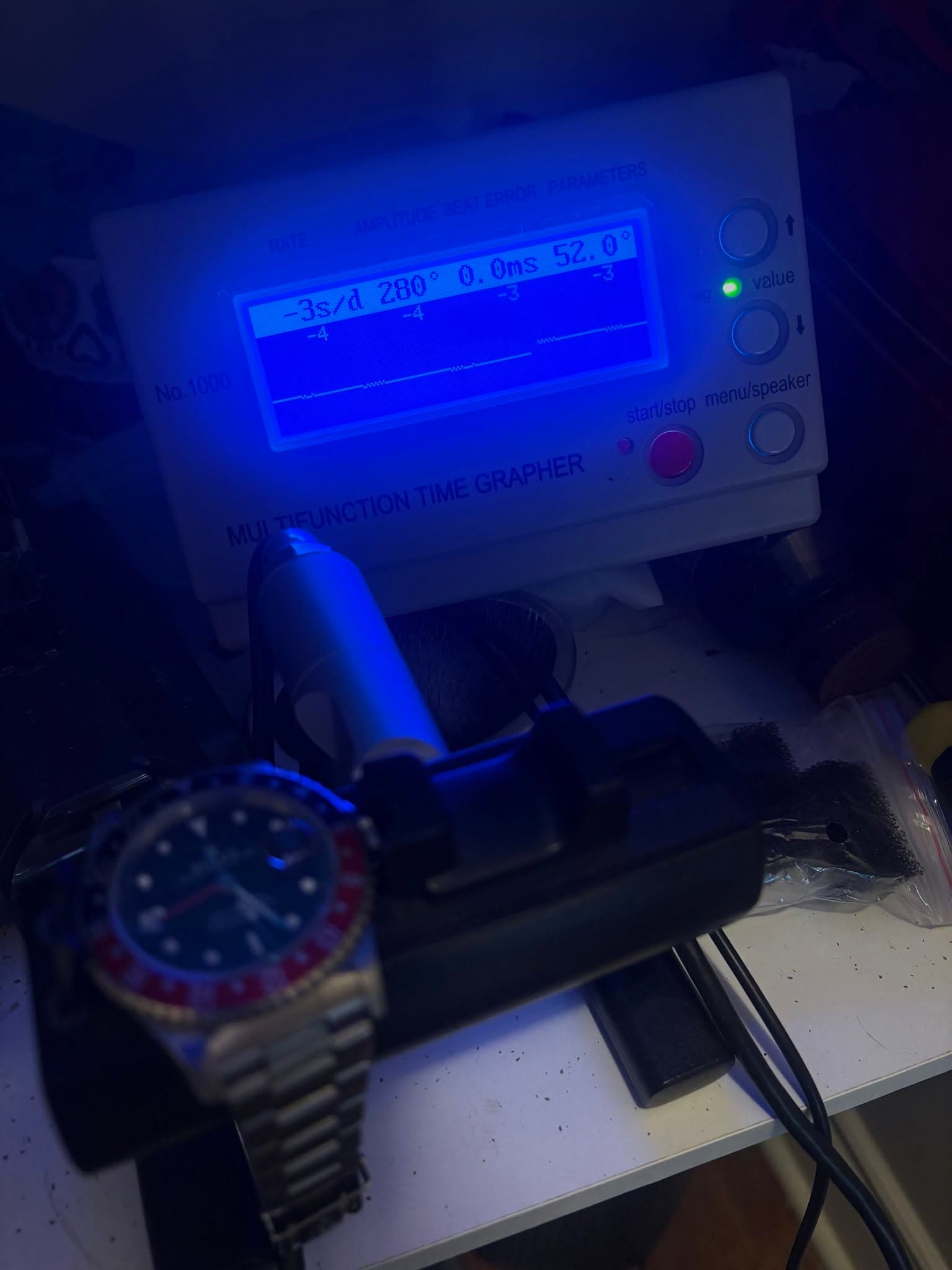 May be an image of digital watch
