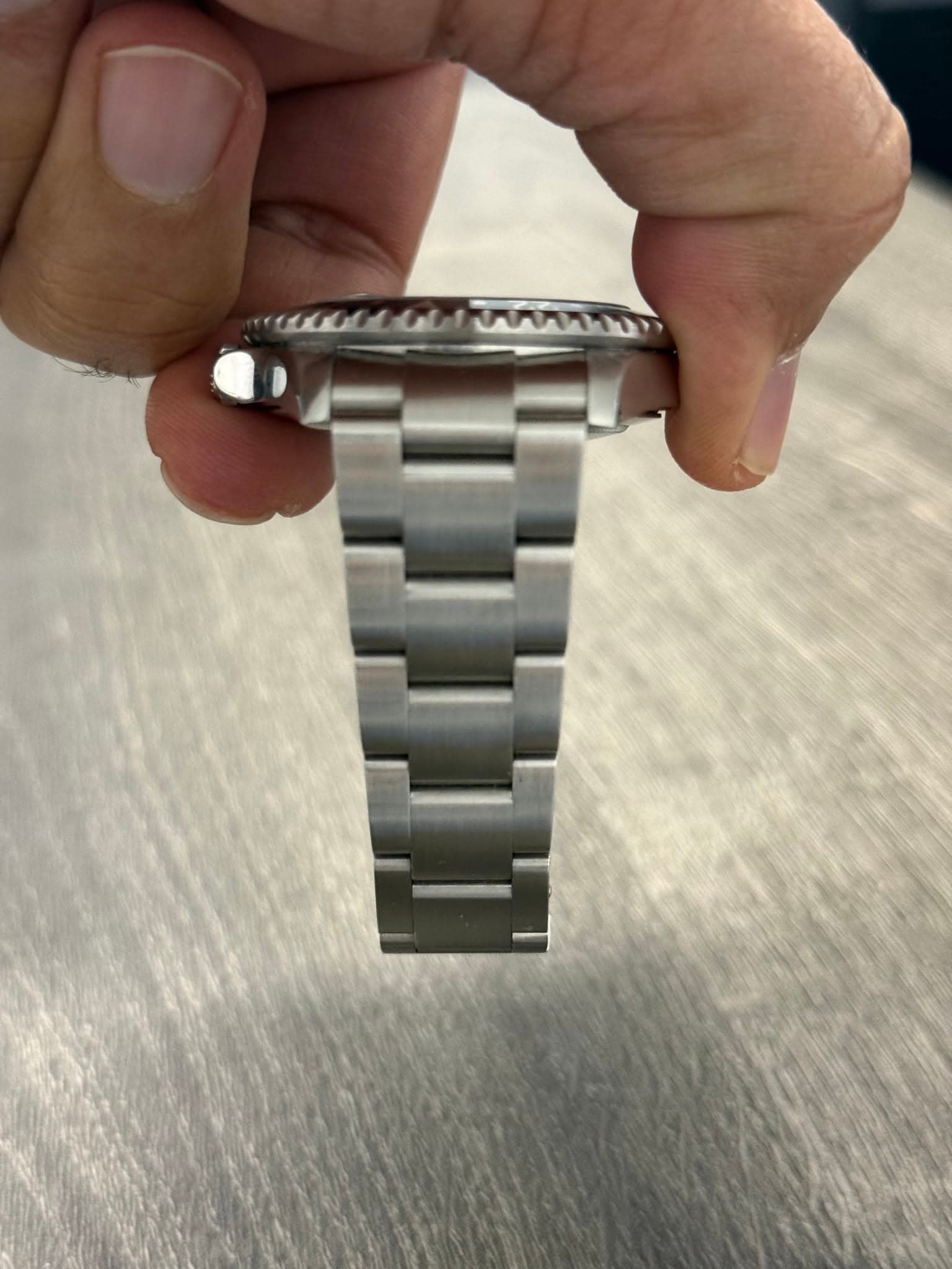 May be an image of wrist watch