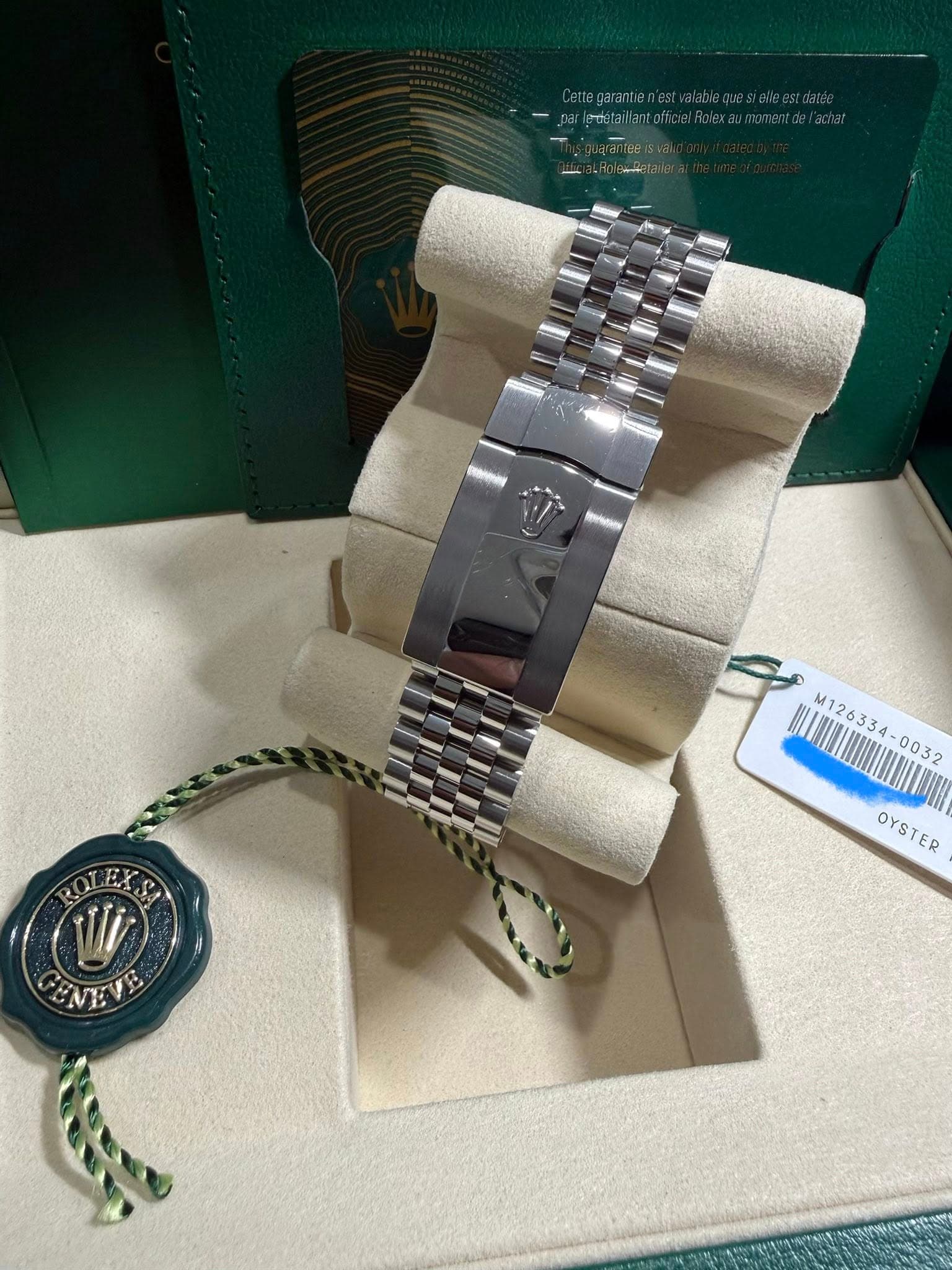 May be an image of wrist watch and text that says ' M126334- M126334 OYSTER OYSTER ENEVB'