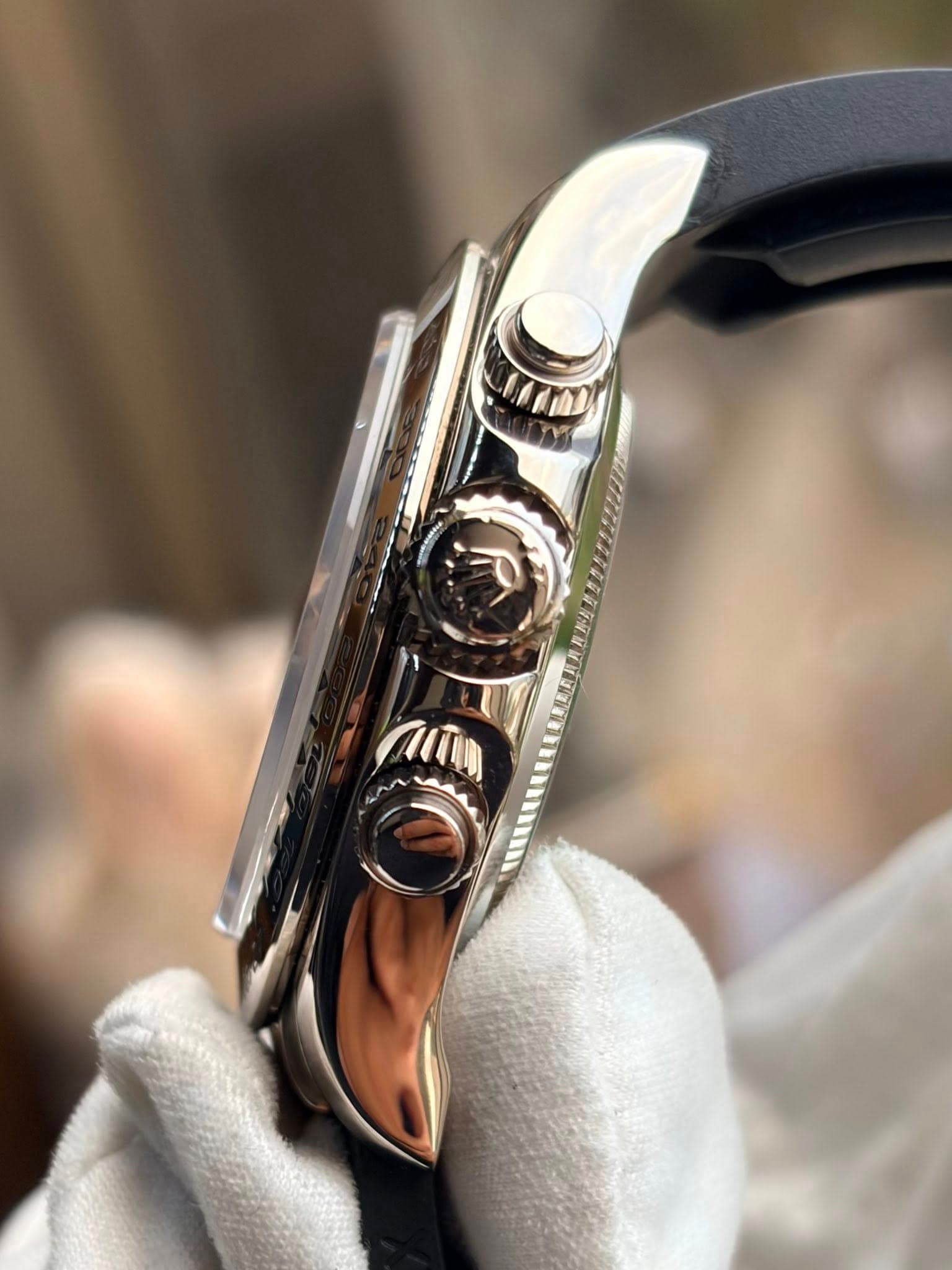 May be an image of wrist watch and text