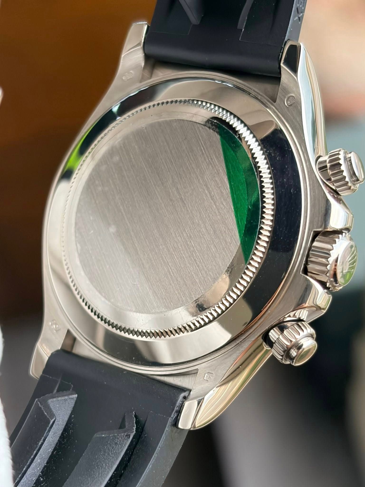 May be an image of wrist watch and text