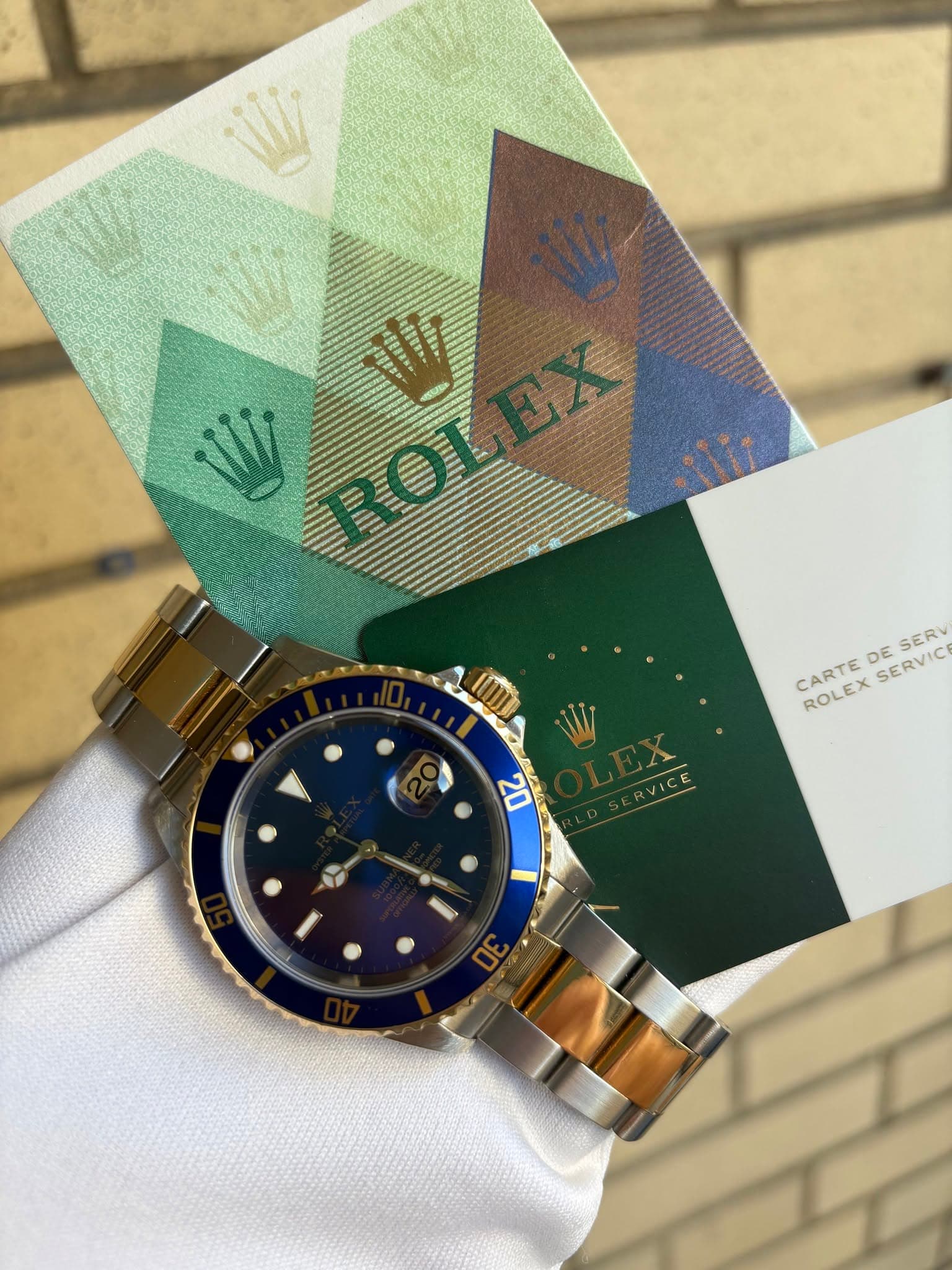 May be an image of wrist watch and text