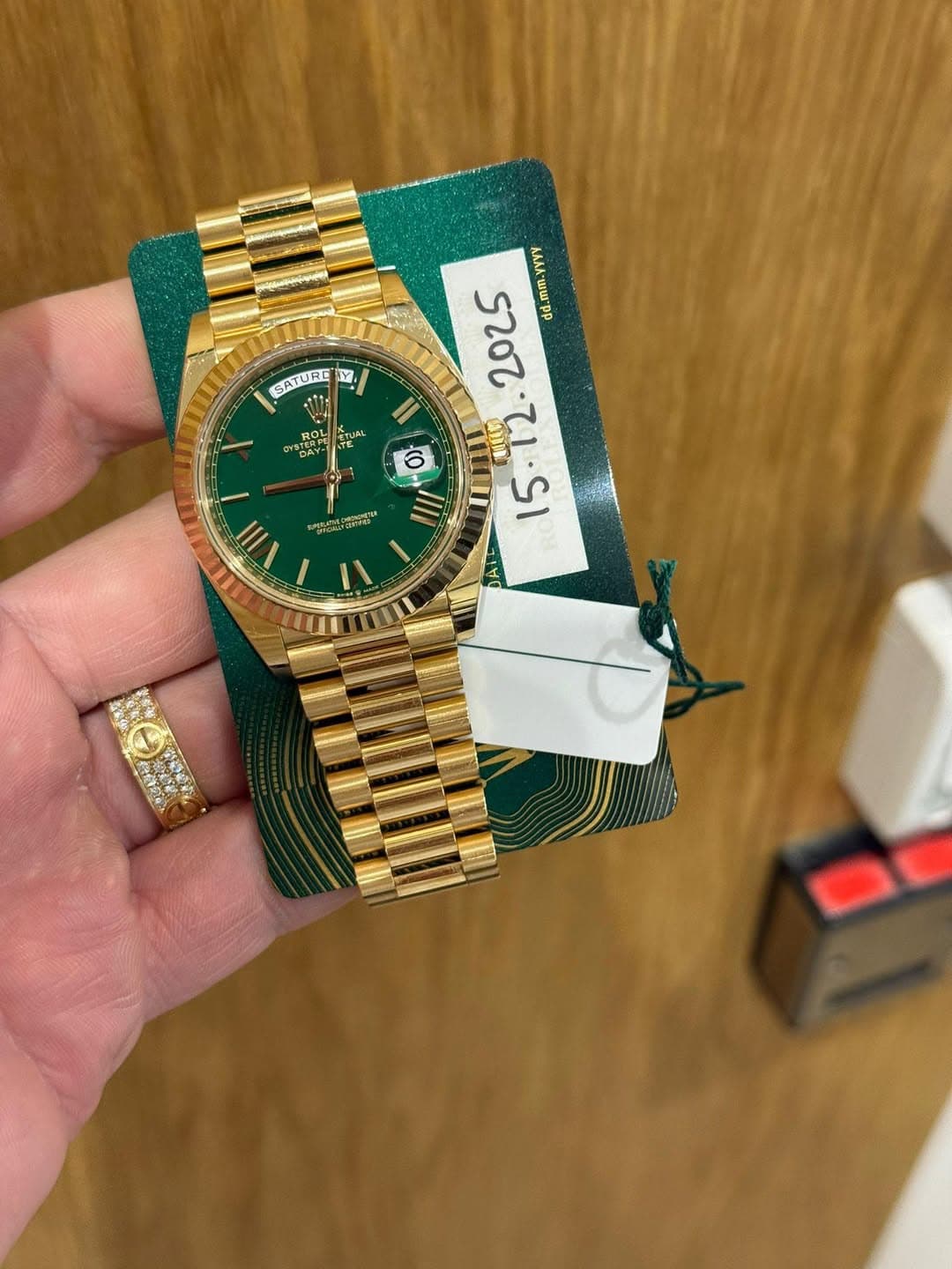 May be an image of wrist watch and text