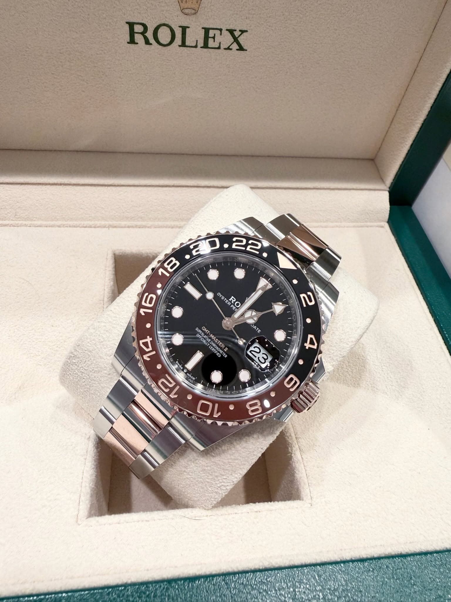 May be an image of wrist watch and text