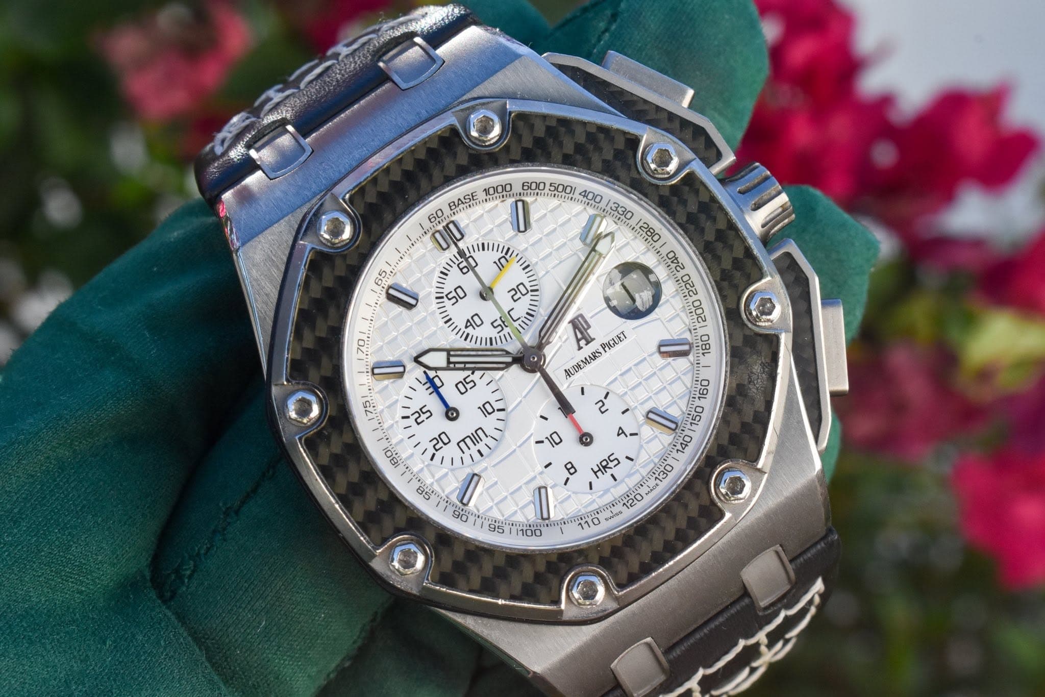 May be an image of wrist watch and text