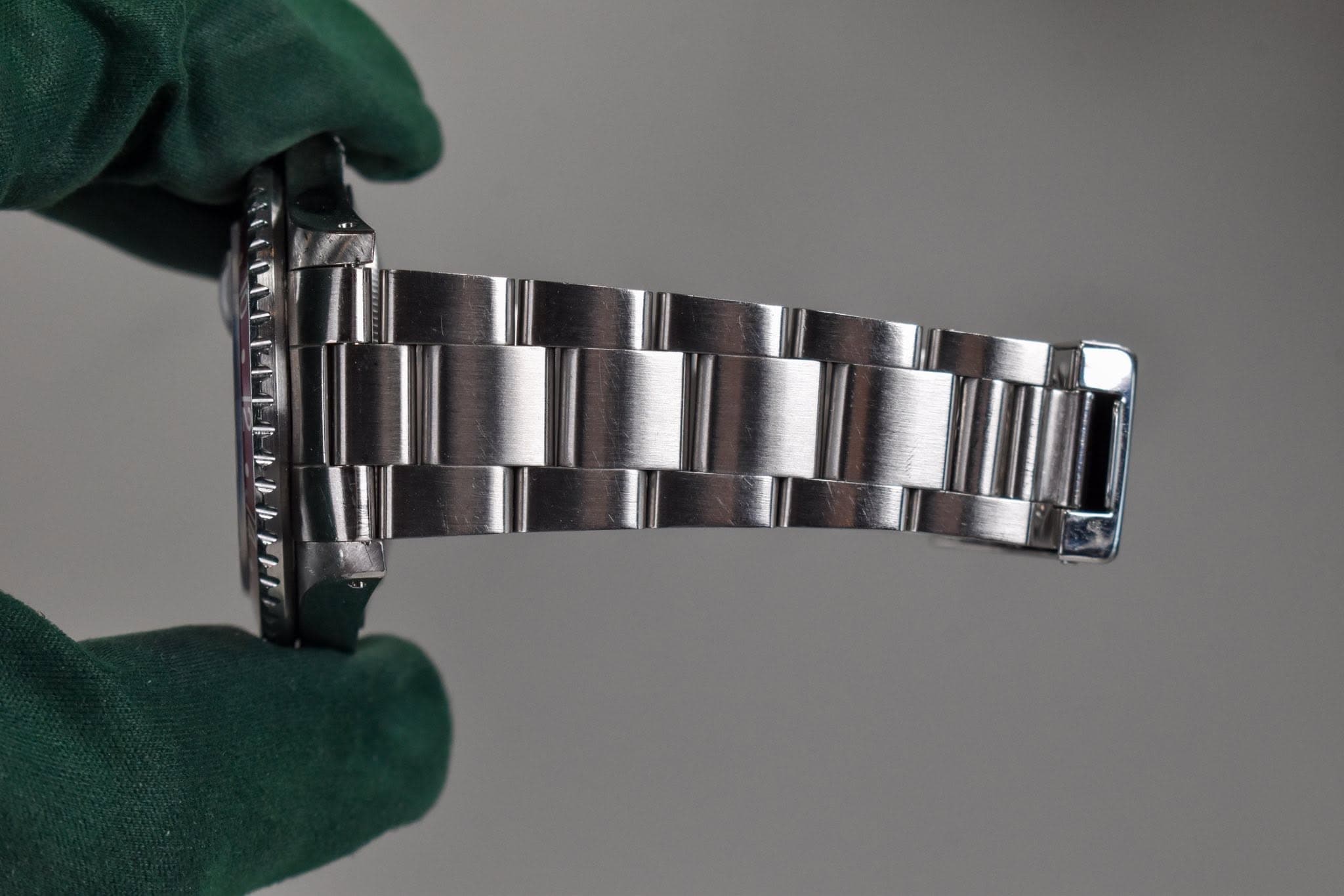 May be an image of wrist watch and text