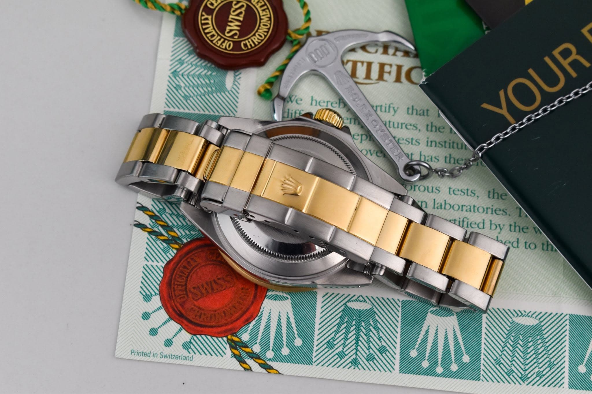 May be an image of jewelry, wrist watch and text that says 'ខនាុជ SWISS HRONON CHRONOMLAI 100 0L TIFIG We hereb difsa Jife UCONI rtify that tures, tures,the the cP ests institu has…