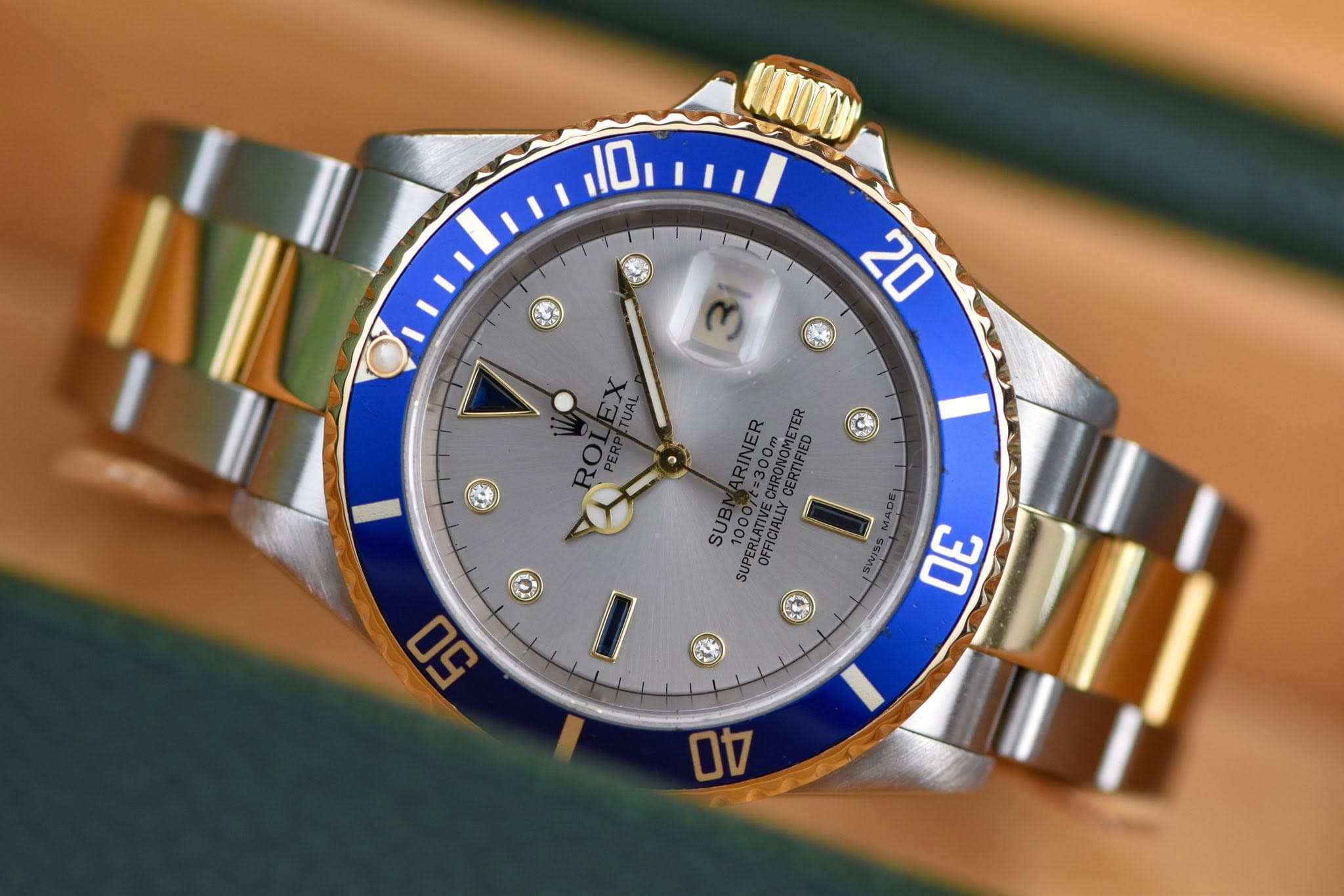 May be an image of wrist watch and text that says '10 20 31 EX ပ ARINER =300m ER =3OMOME CHRONOME CERTIFIED SUB 10CVE SUPERLATIVE SUPERLATIVE OFFICIALLY 50 30 I 台'