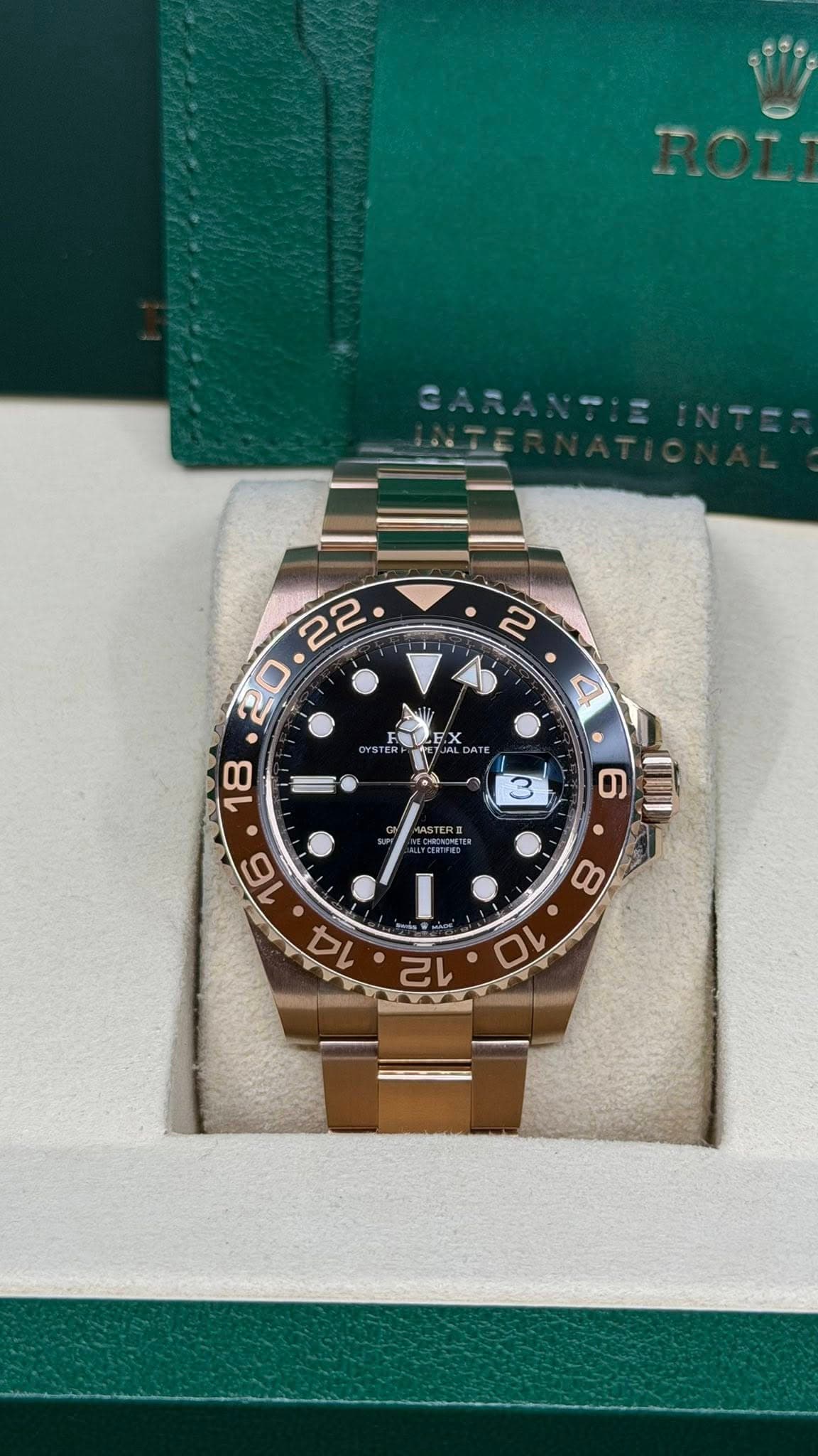 May be an image of wrist watch and text