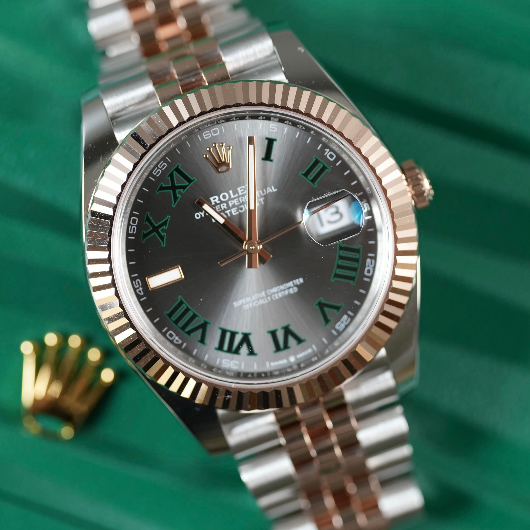 May be an image of wrist watch and text