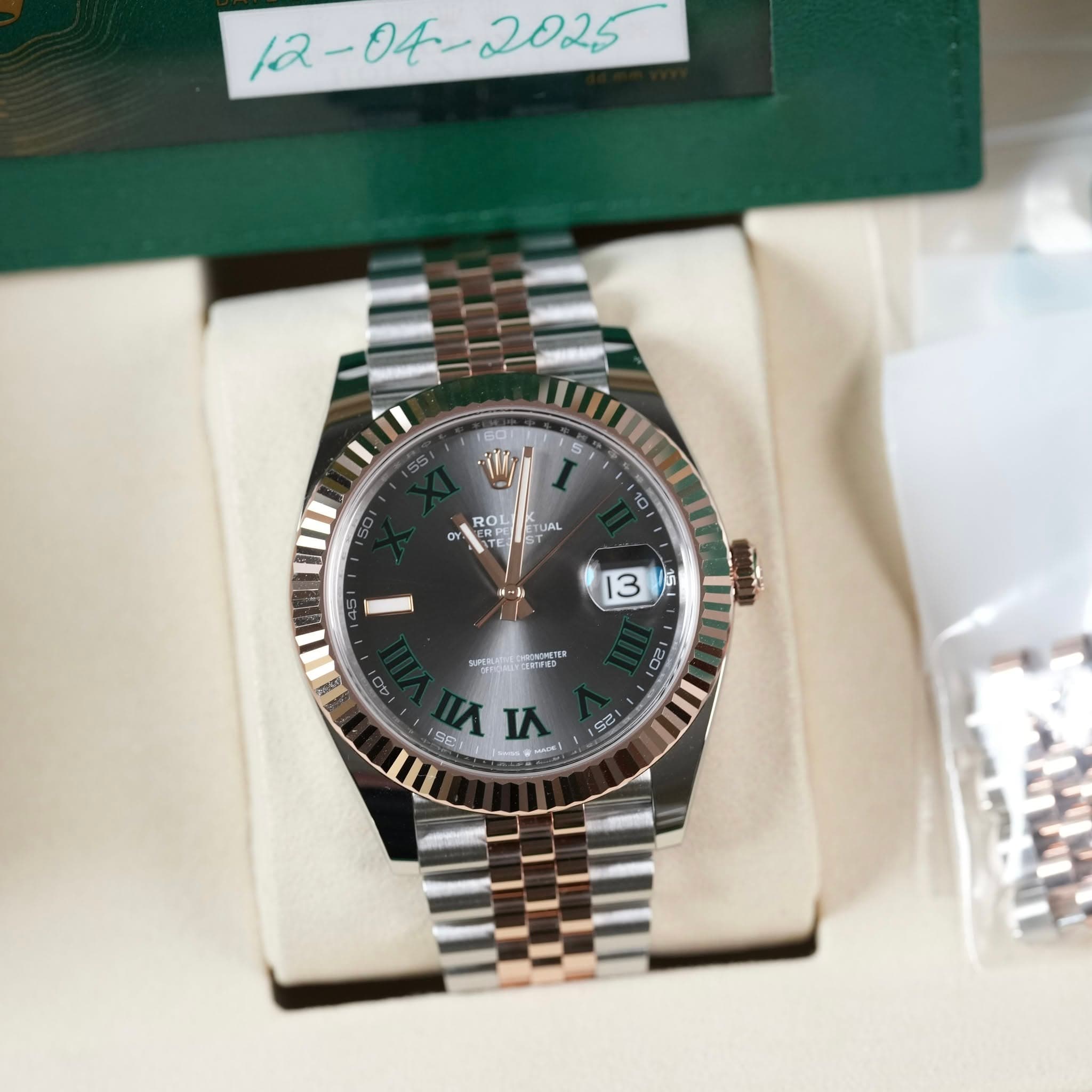 May be an image of wrist watch and text