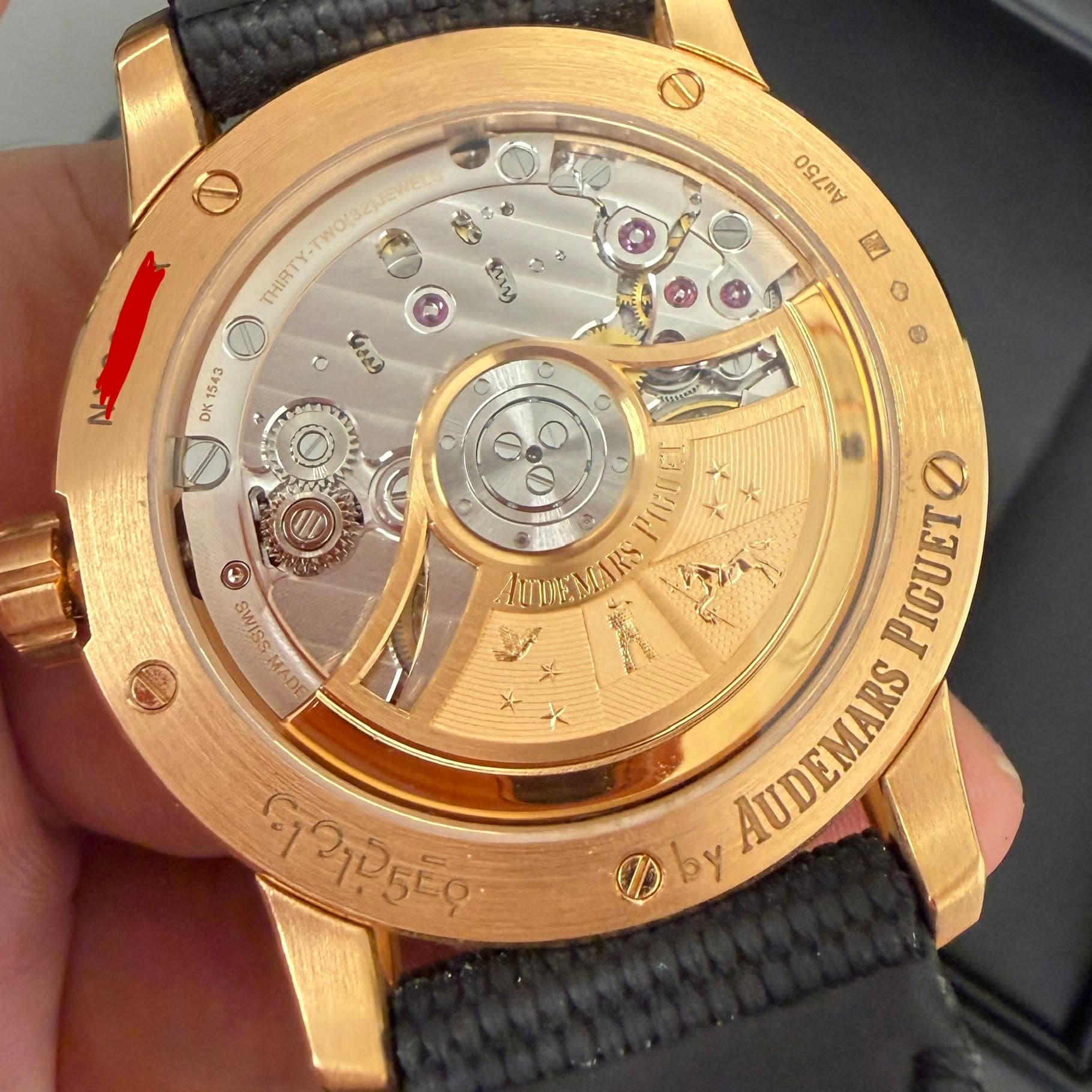 May be an image of wrist watch and text