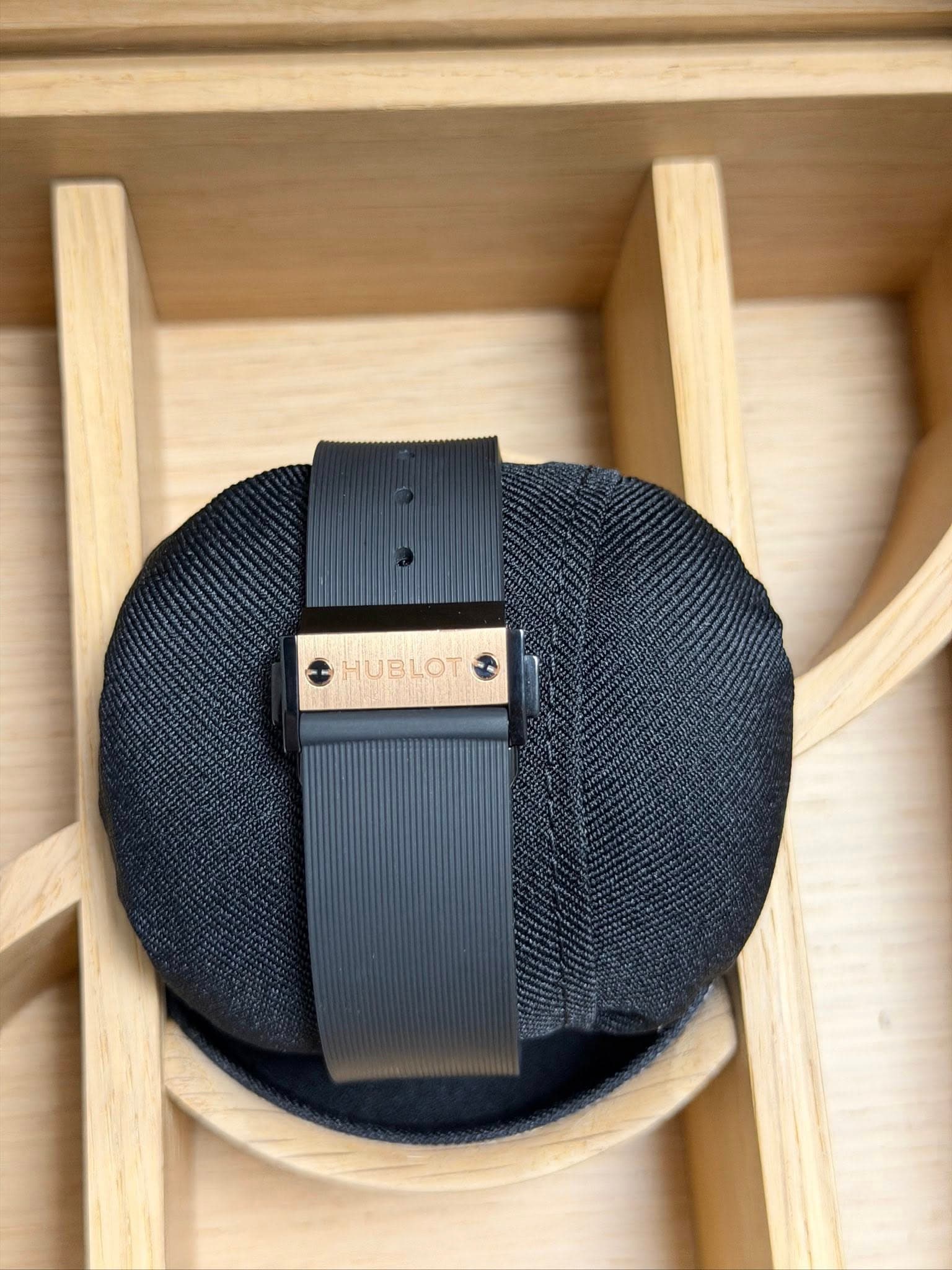 May be an image of leather, wrist watch and text that says 'HUBLOT'