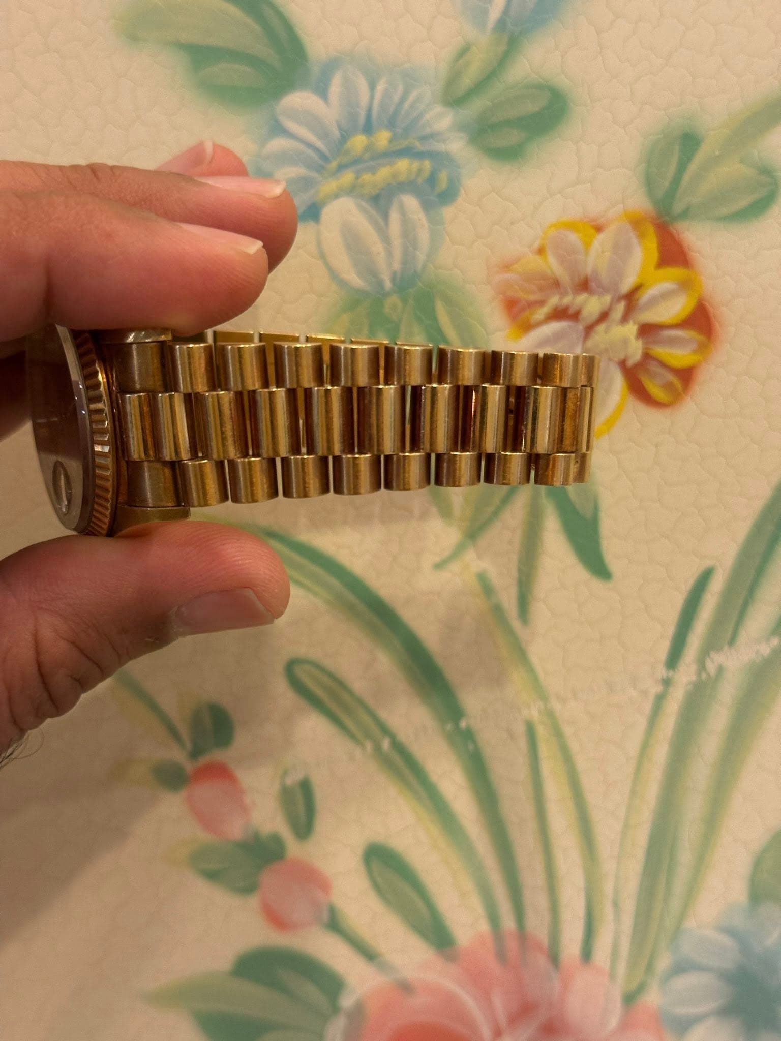May be an image of wrist watch