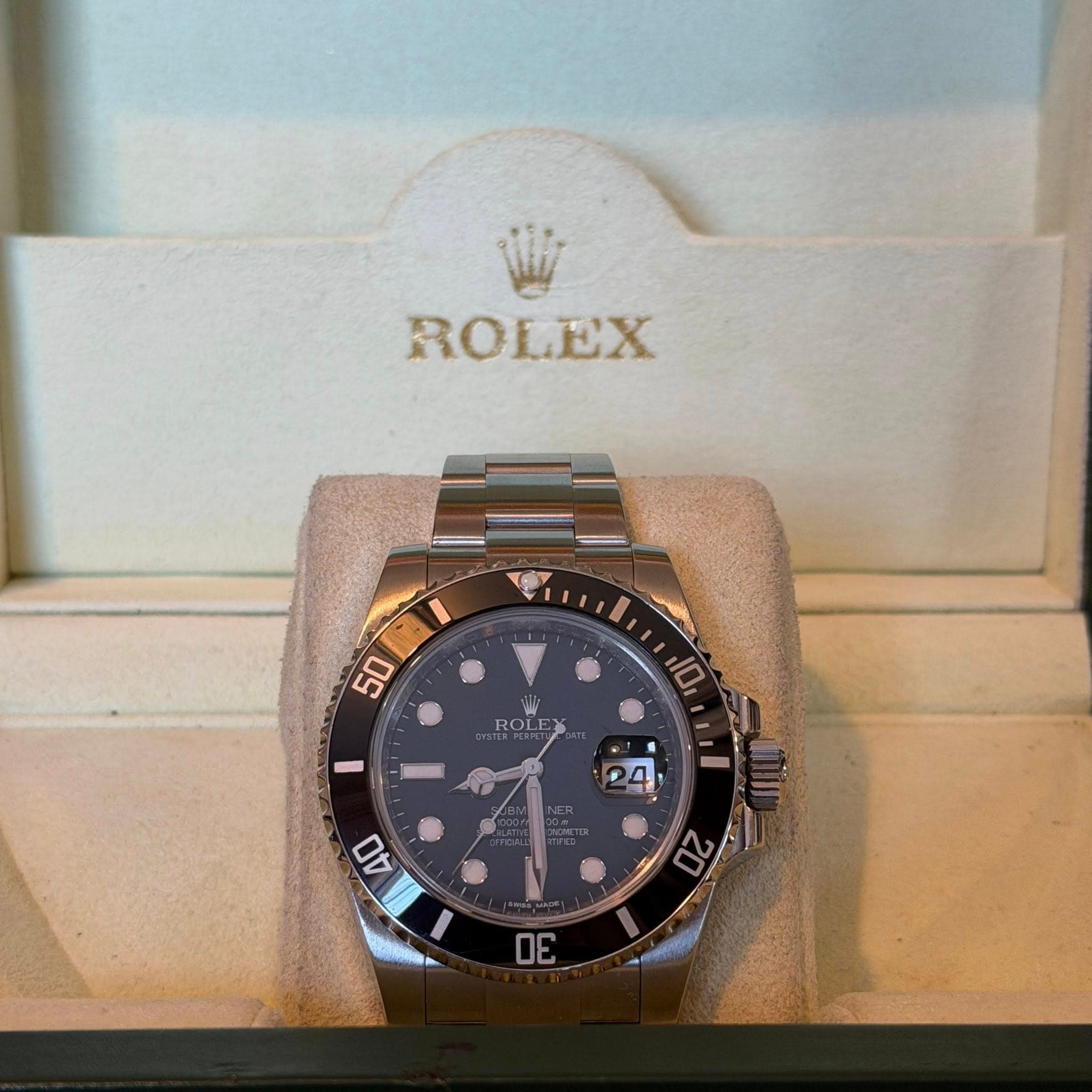 May be an image of wrist watch and text that says 'ROLEX 50 10 ROLE 4 40 3E 3E'