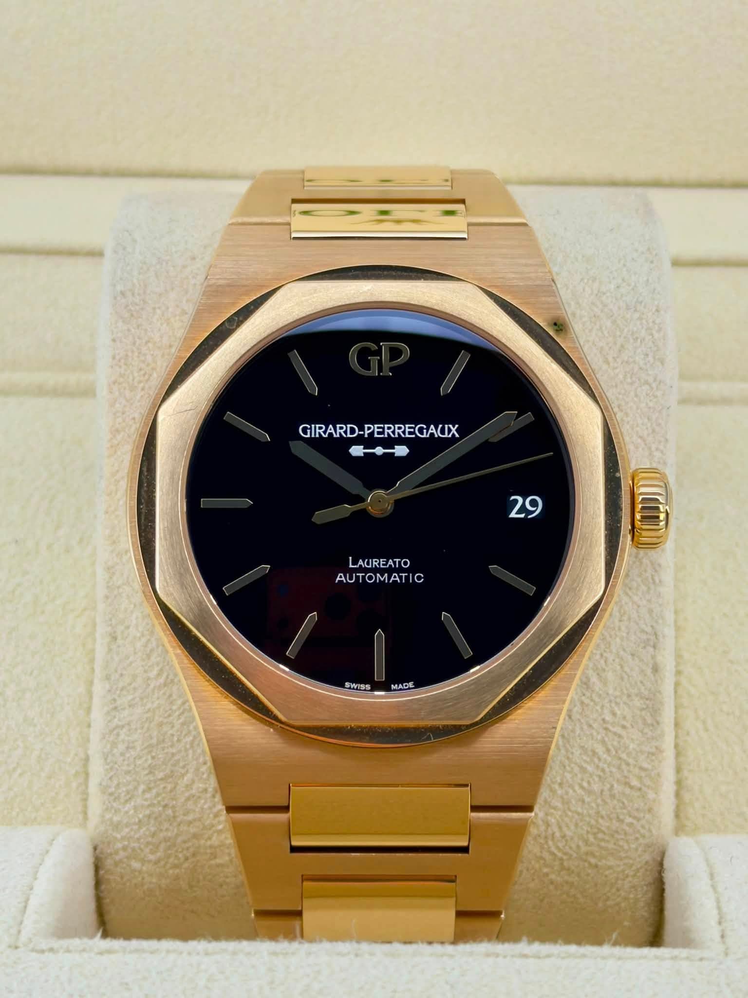 May be an image of digital watch and text that says 'GIRARD-PERREGAUX 29 LAUREATO AUTOMATIC CM SWISS MADE'