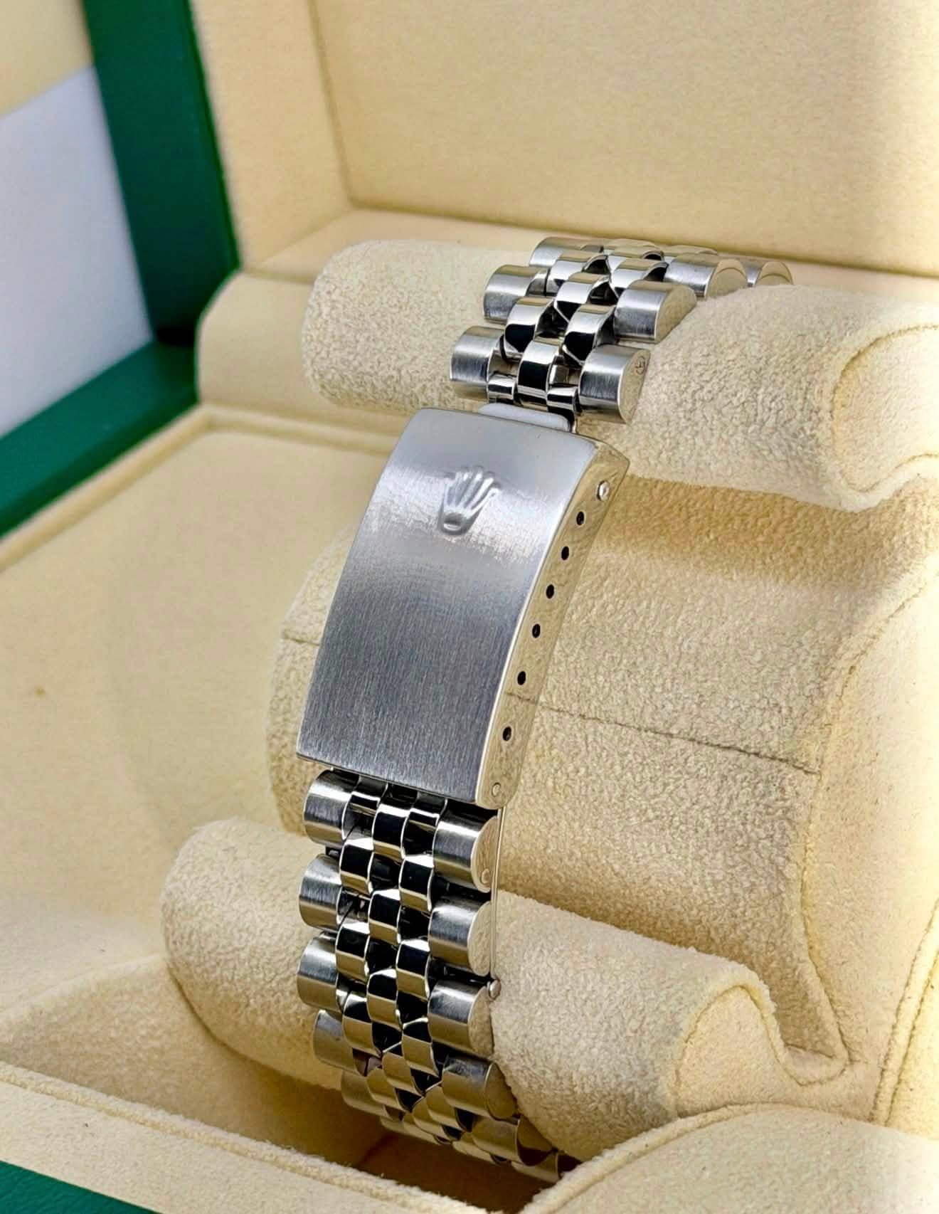 May be an image of wrist watch