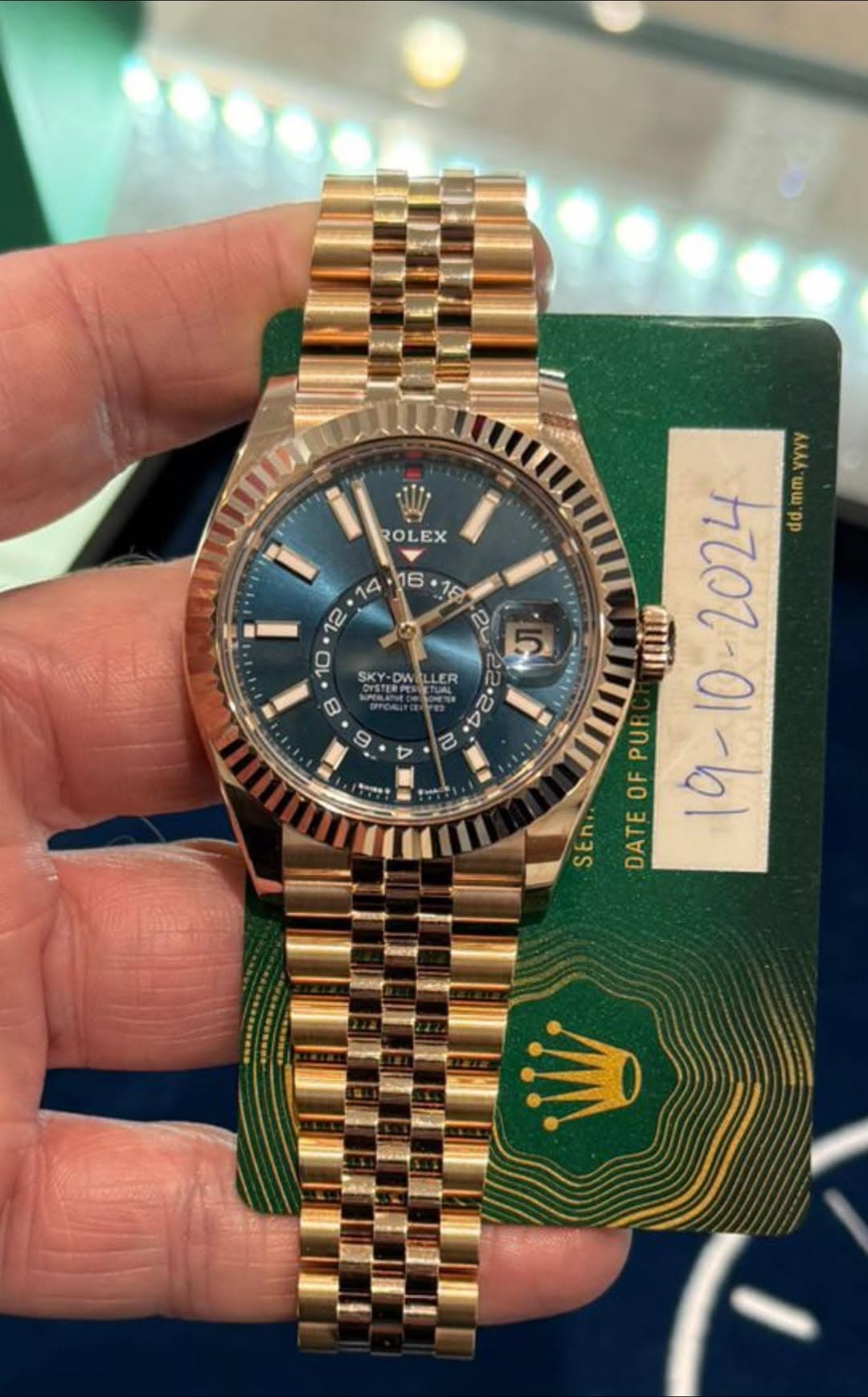 May be an image of wrist watch and text that says 'ROLEX EX ROL مت SKY اف TERPE DW LER B S O 4 yyyy mm or 1 الن လ DFRUO- የ u 2024 ที dd. 2 PUT OF SEn DATE'