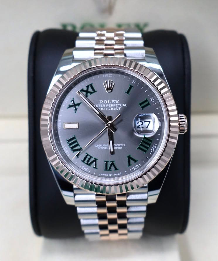 May be an image of wrist watch and text that says '5 10 60 XXI 55 V ROLEX YSTER STERPEDLX ERPERPET TUAL DATEJUST ATE EJUS 45 I III SUPERLATIVE ONOMETE NUPHE S0 今 VL WnA FFICIALL…