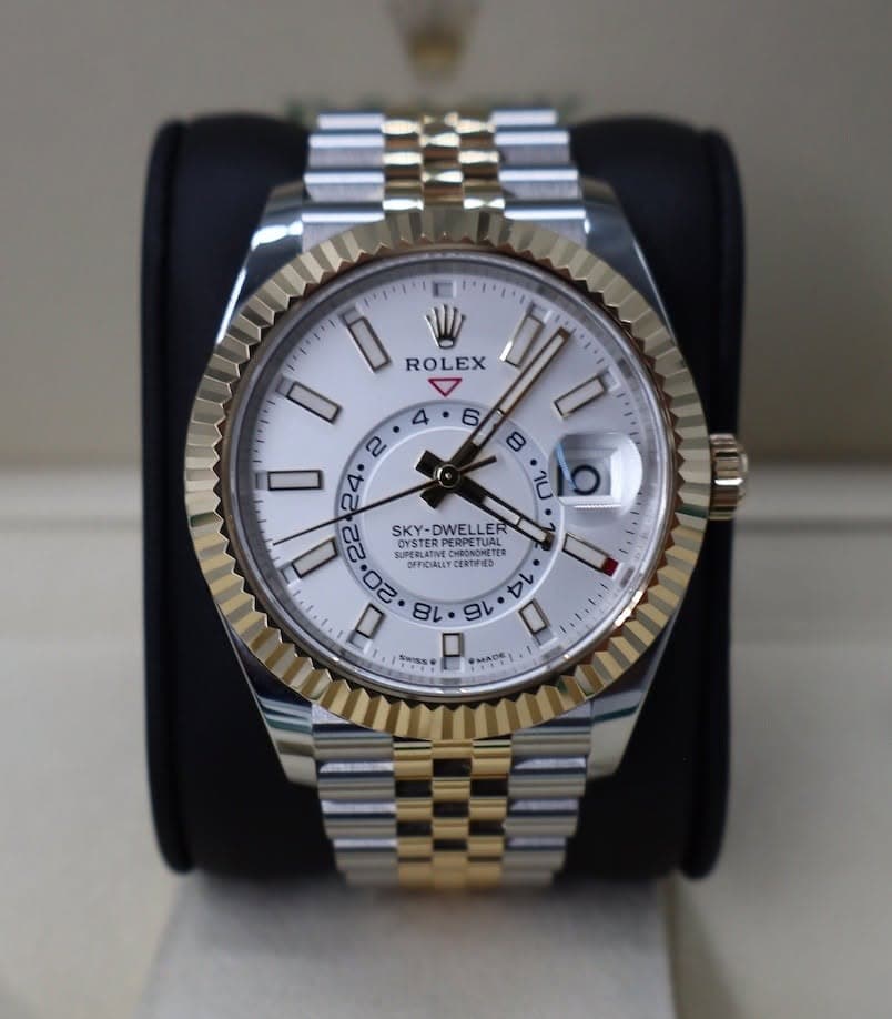 May be an image of wrist watch and text