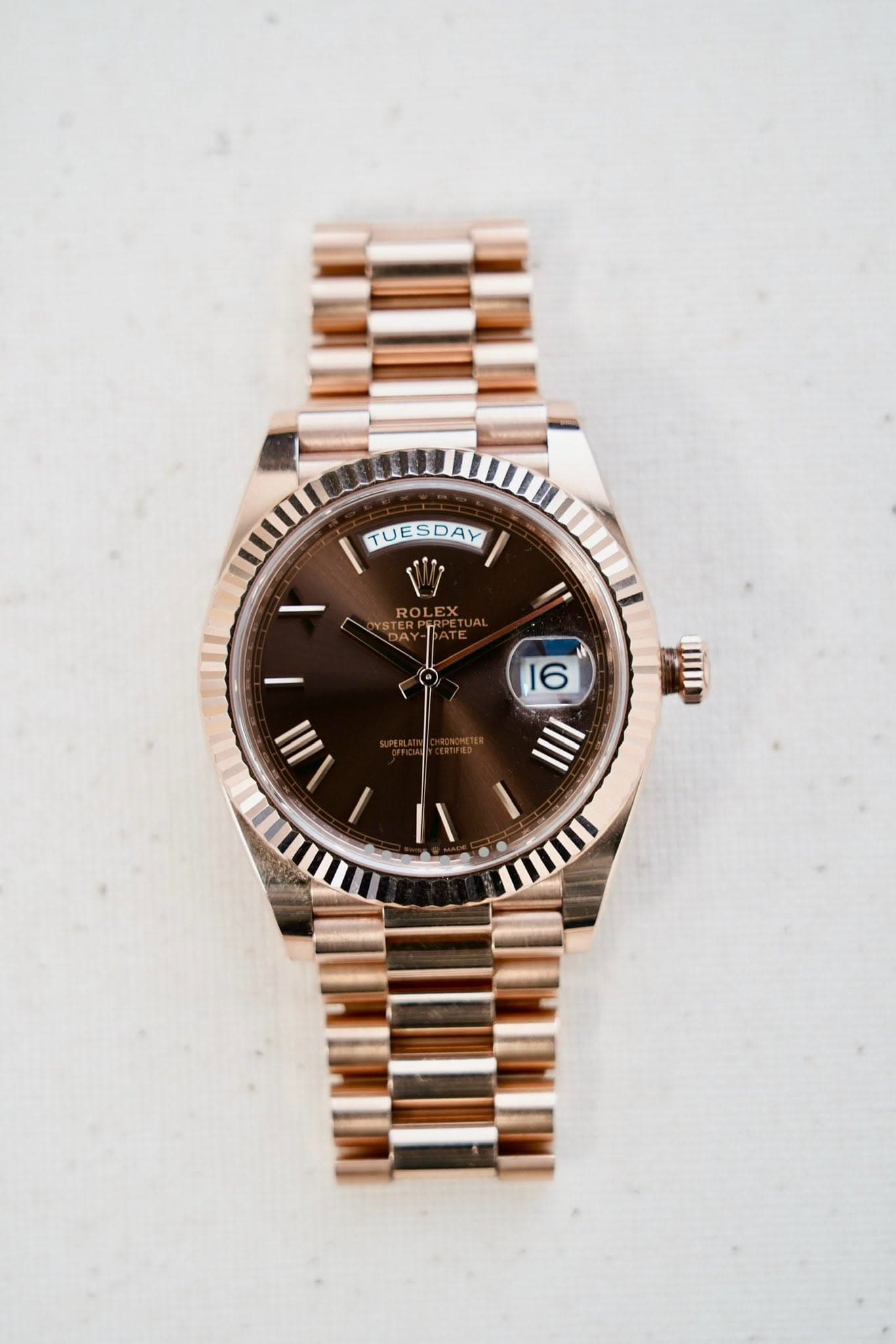 May be an image of wrist watch and text that says 'TUESDAY ROLEX 11 WID III 16 IIII I ١'