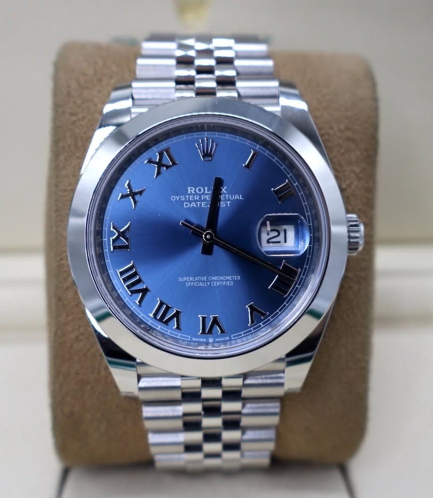 May be an image of wrist watch and text that says 'TUAL ST 21 XI X ROL OYS OYSTER ERPE DATE کلم E VIII SUPERLATI ERLATINVE.CHRONOMETE SUPERLATIVE.CHRONOMETER CHRONOMETE…
