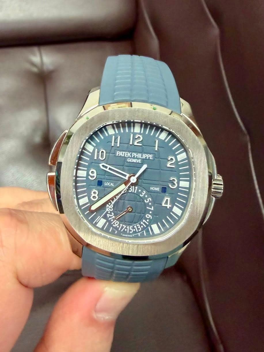 May be an image of text that says '9 1112| I 11 12 10 PATEK PHILIPPE PATEKPHILIPPE LIPPE GENEVE 2 LOCAL ထ HOME 3 س د -EA1 7:15.13-11- ك -قب 9 021- 3 aиblи 311'