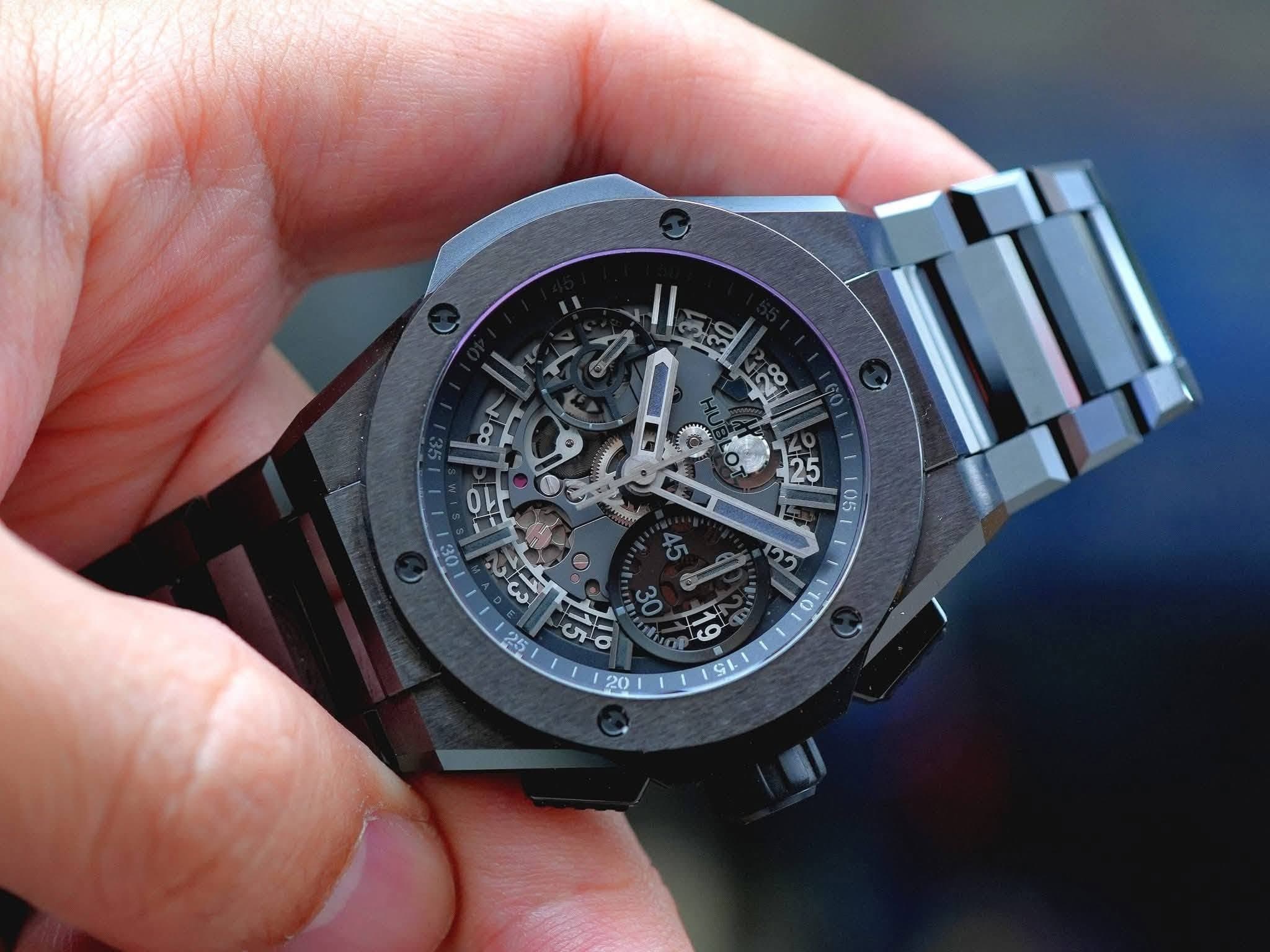 May be an image of wrist watch and text