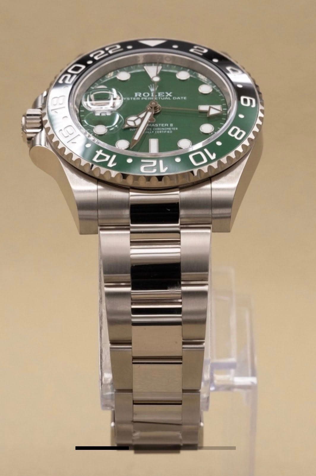 May be an image of wrist watch and text