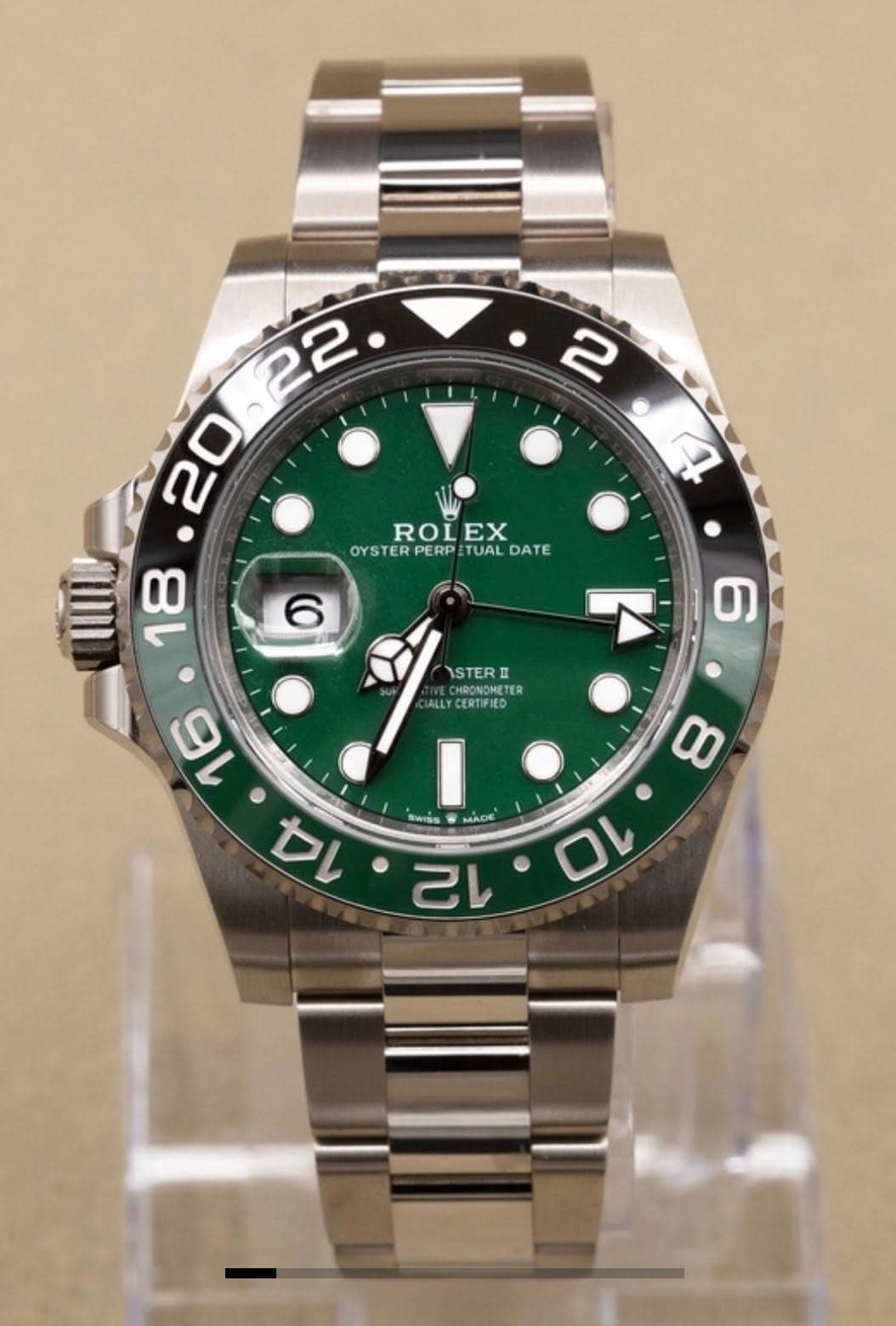 May be an image of wrist watch and text that says ' ROLEX EX ROL OYSTER OYSTERPERP:TUALDATE PERP TUAL DATE 18 6 ر 6 ISTER ロ CHRONOMETER TER ALLY CERTIFIED I eSS عمنیه MC ACE…