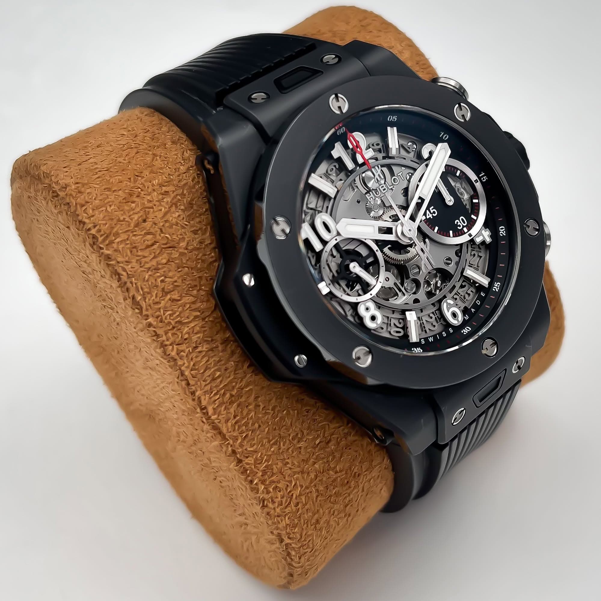 May be an image of wrist watch and text