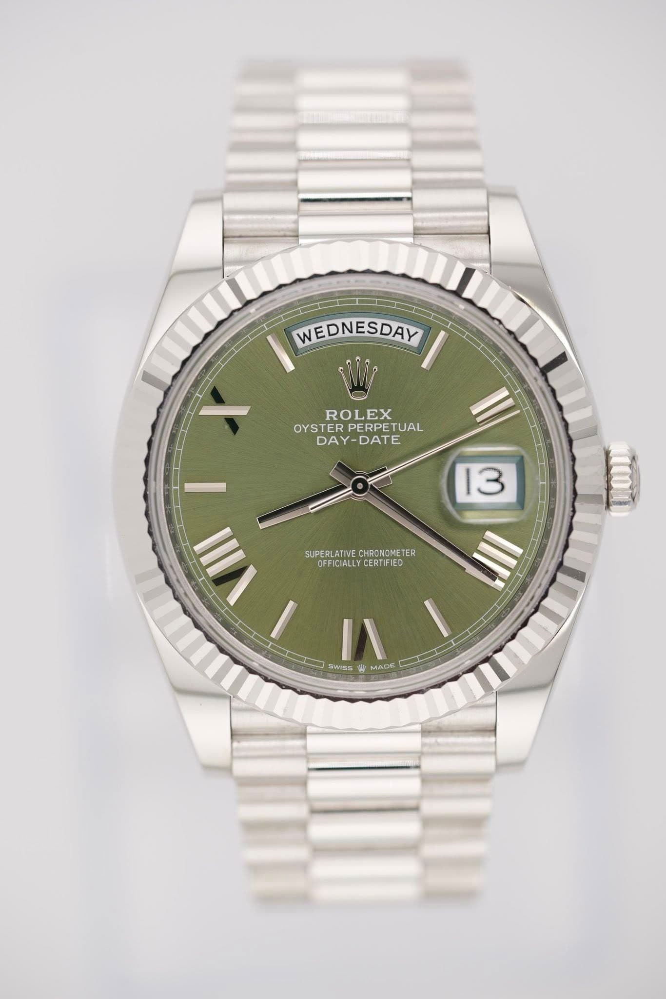 May be an image of wrist watch and text that says 'WEDNESDAY ROLEX OYSTER OYSTERPERPETUAL PERPETUAL TUAL DAY-DATE DAY DATE 13 I VIII SUPERLATIVE CHRONOMETER SUPERLATINE.CKECNOMETER…