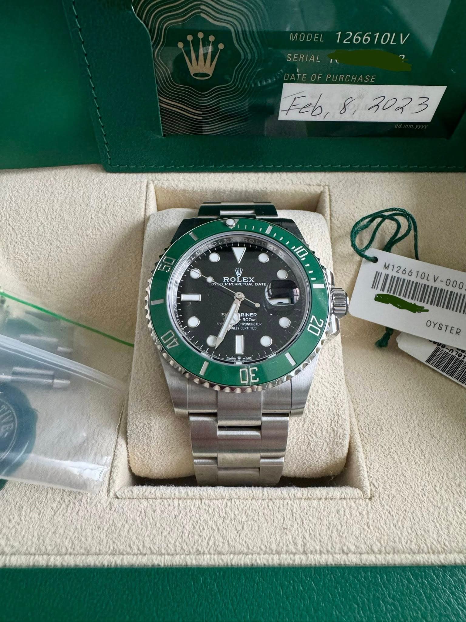 May be an image of wrist watch and text that says '126610LV Feb, Feb,8,3023 8, 3023 ၁ 10 W KaKлcTий ROLE DATE 밥 1000 RINEH RINER CHRONOE e M126610L M126610LV-000 V- teht 30 OYSTER'