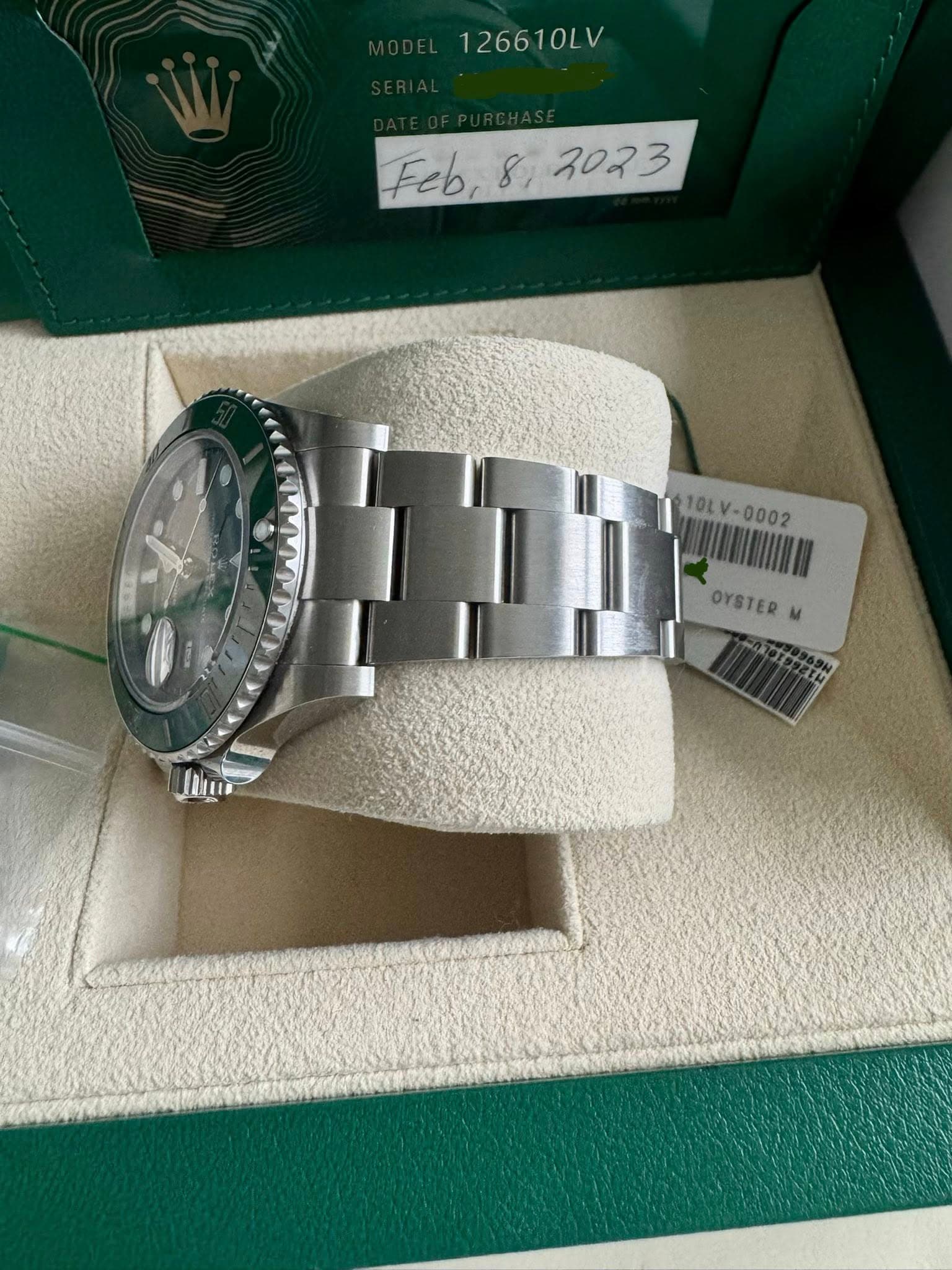 May be an image of wrist watch and text that says '126610LV Feb,8 Feb,8:3023 8, 3023 JeLA 10LV-0002 10LV- LV-0002 L OYSTERM OYSTER 000ដ'