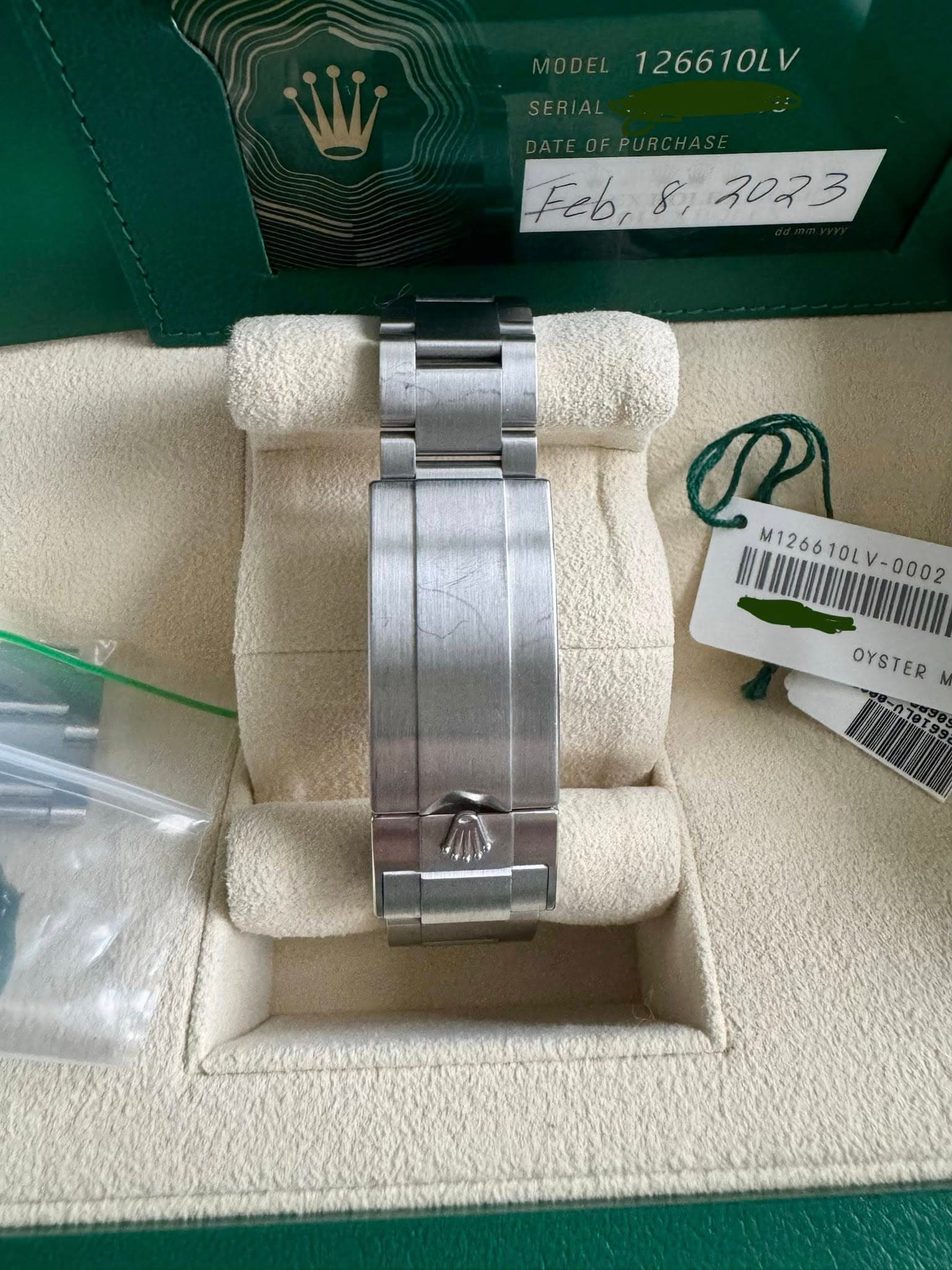 May be an image of wrist watch and text that says '126610LV 10LV 1266 Feb, Feb,8,3023 8, 3023 P M126610L M126610LV- v- OYSTER -010T9'