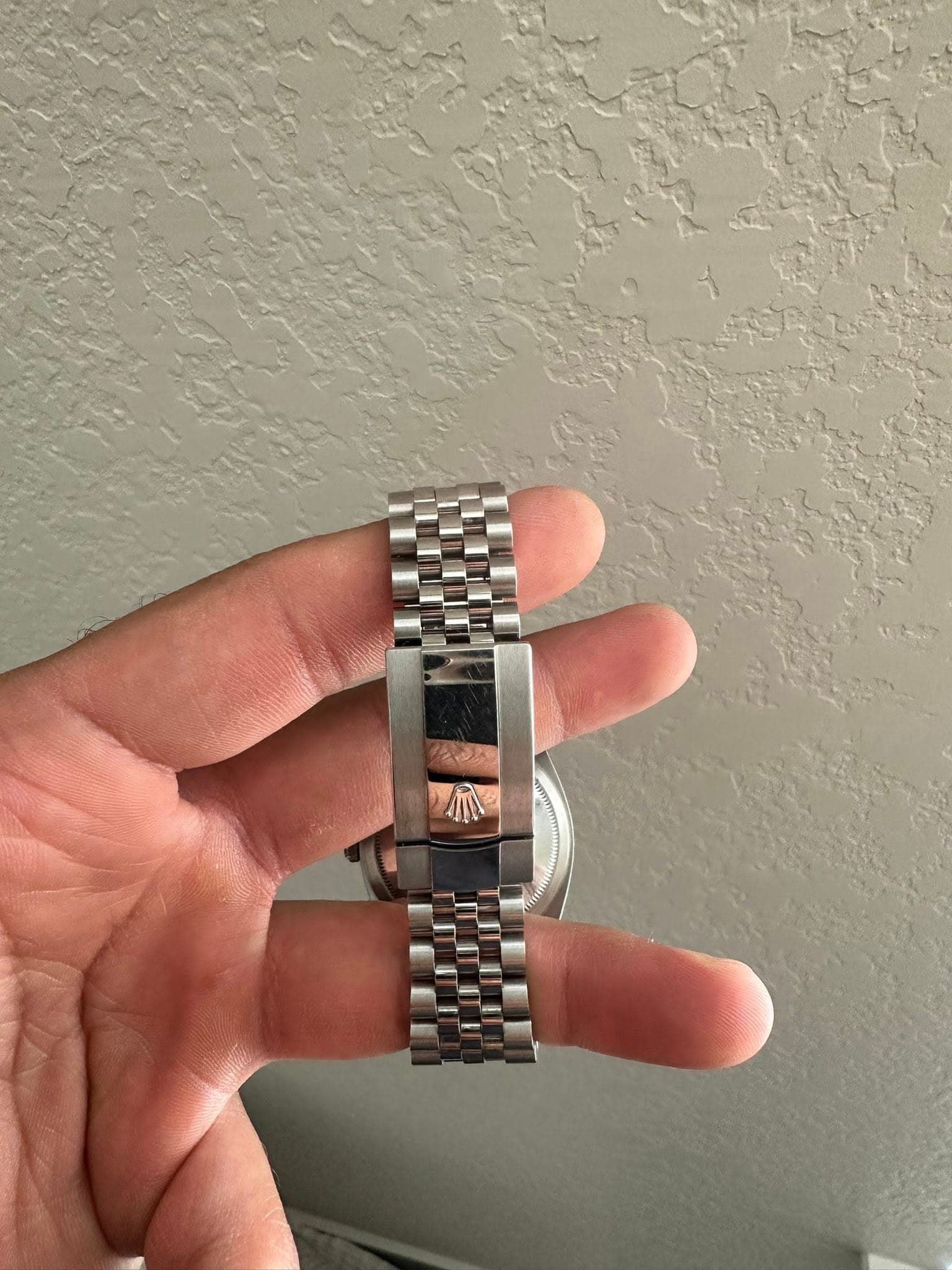 May be an image of wrist watch