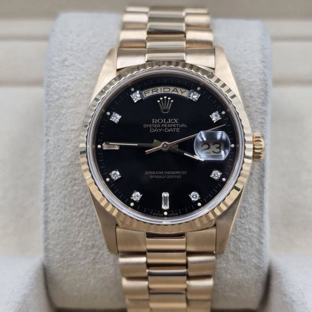 May be an image of wrist watch and text