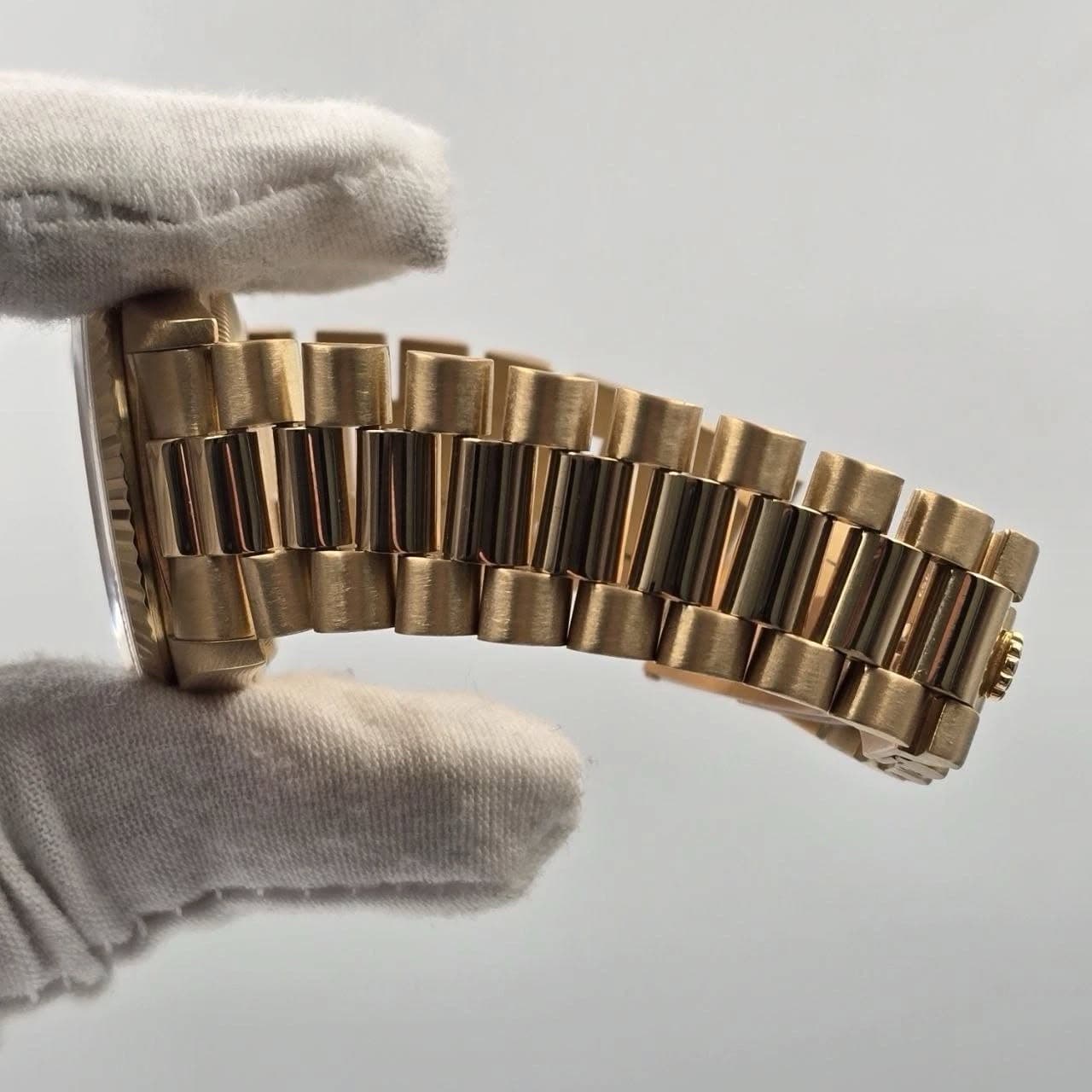 May be an image of wrist watch