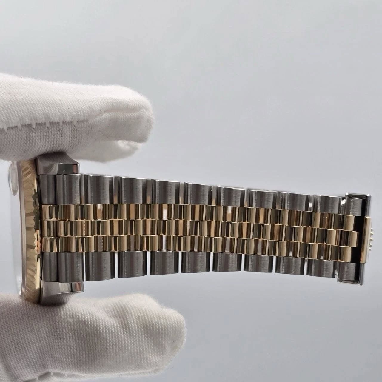 May be an image of wrist watch