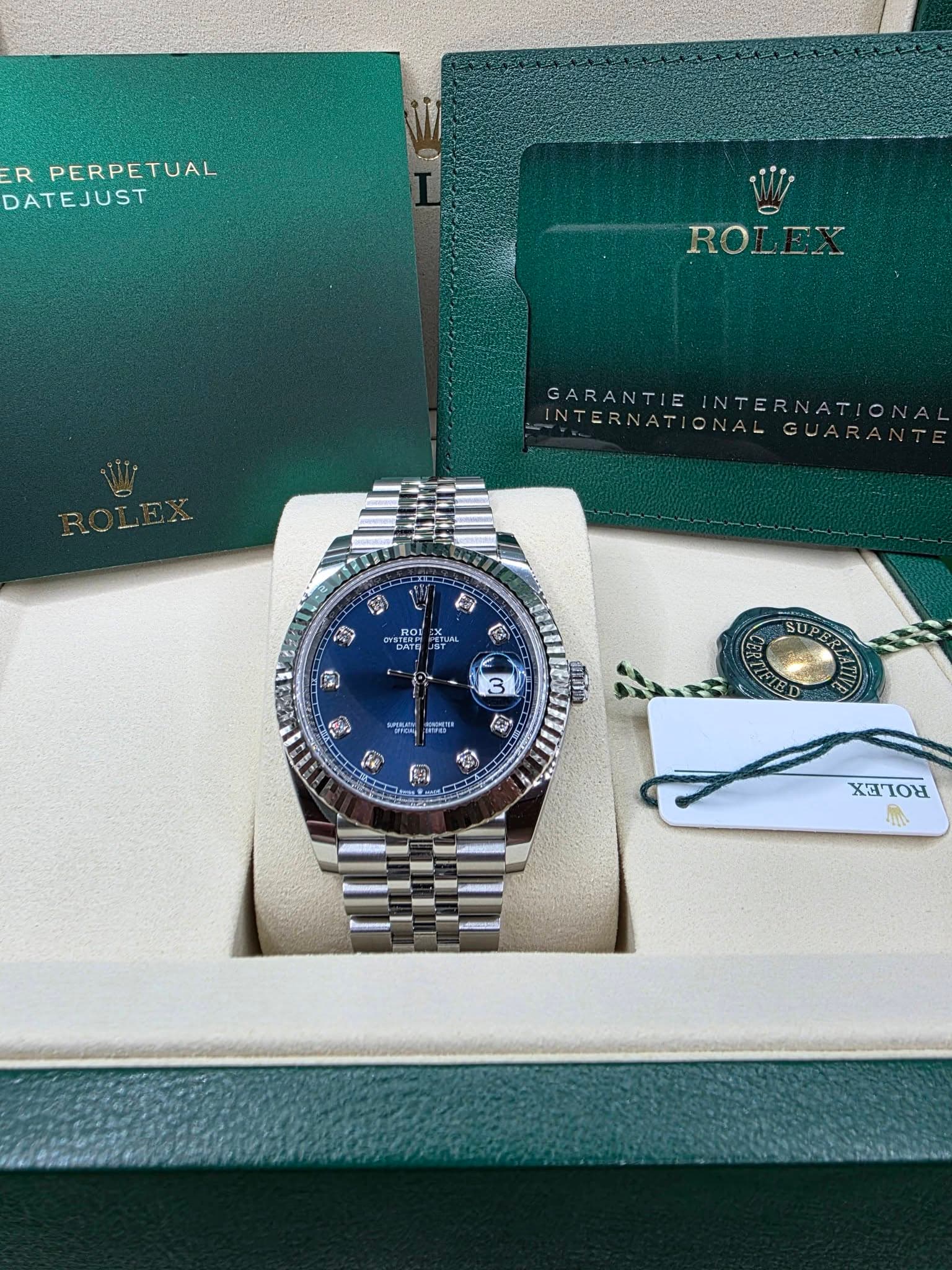 May be an image of wrist watch and text that says 'R PERPETUAL DATEJUST ROLEX GARANTIE GARANTIEINTERNATIONAI INTERNATIONA INTERNATIONALG Ay 6ЛT ASTEREL EREY 1ド TURL 肉 នា 한 반여" د…