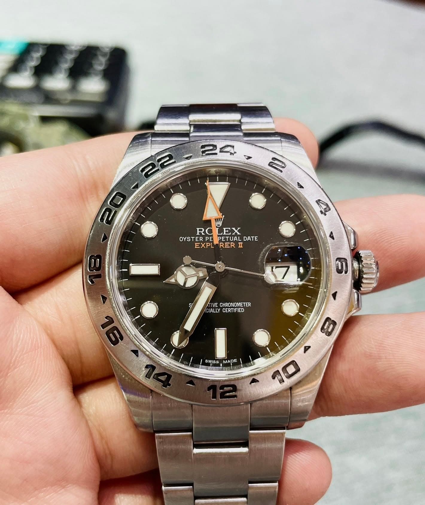 May be an image of wrist watch and text