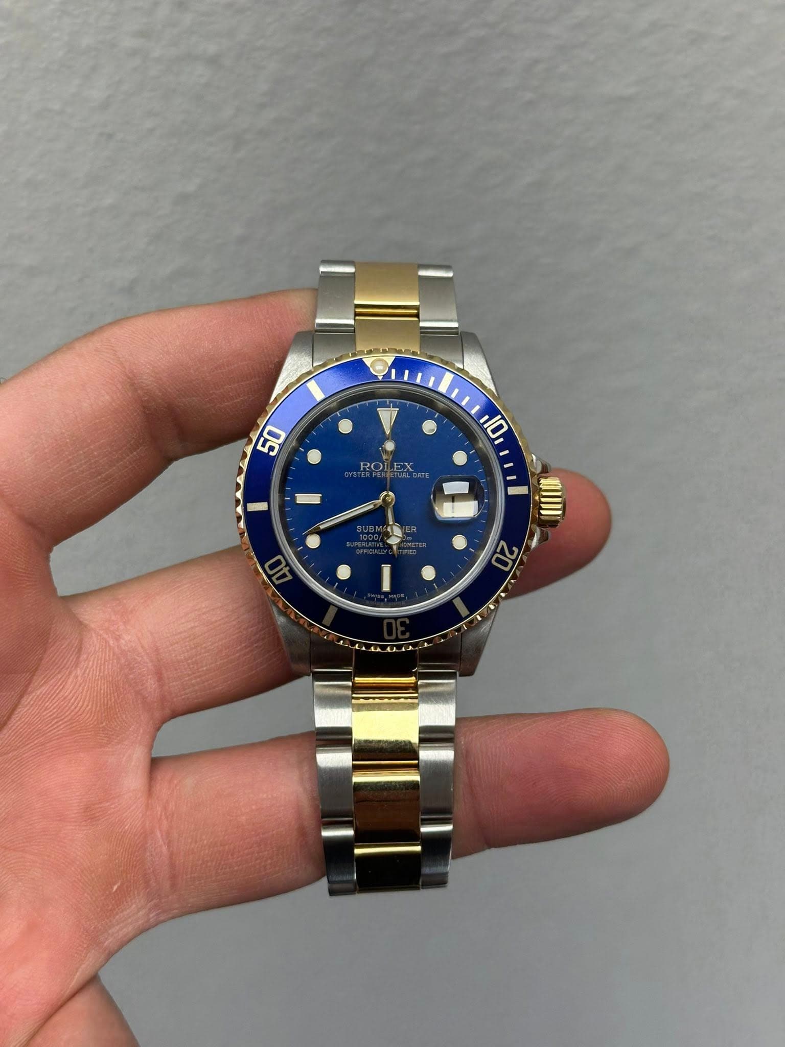 May be an image of wrist watch and text that says '50 10 ROLEX.. ROI 第川川 20'