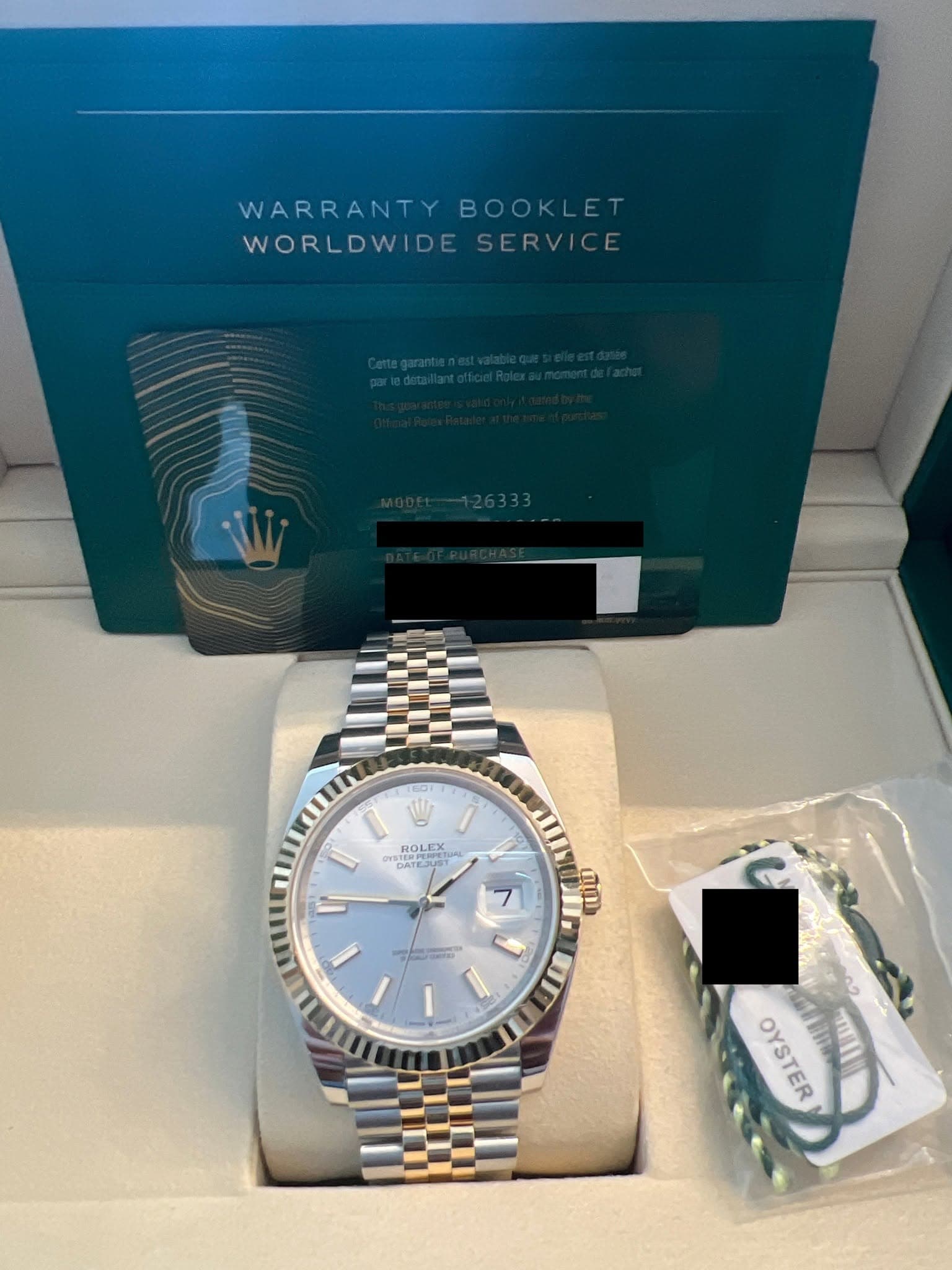 May be an image of wrist watch and text that says 'WARRANTY WARRANTYBOOKLET BOOKLET WORLDWIDE WORLDWIDESERVICE SERVICE 1EO ေ 밤 ROLEX aHex RICE B印KE DATES CDPERFET Us 7 ពុញញា ١ 町:…
