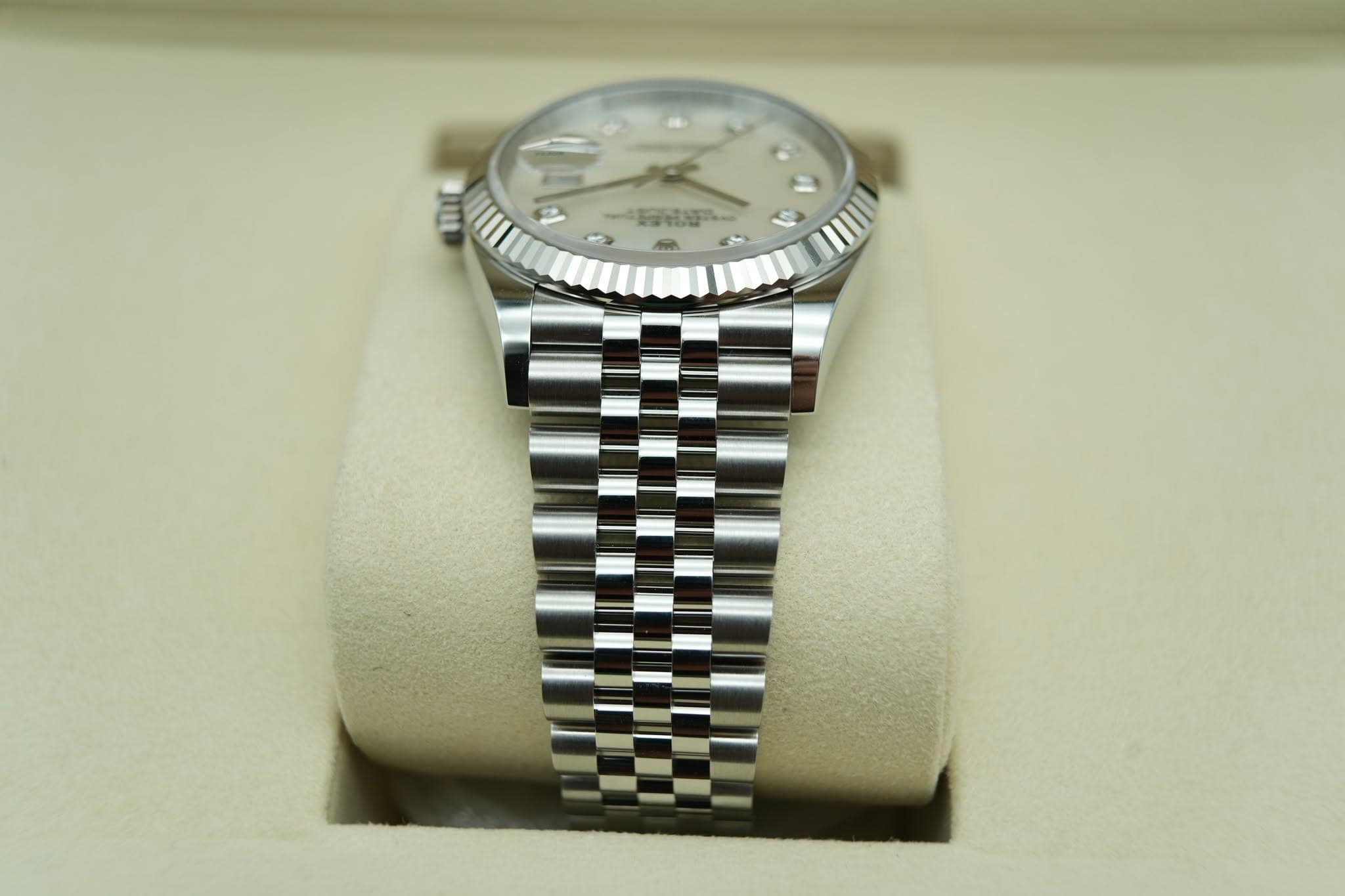 May be an image of wrist watch and text