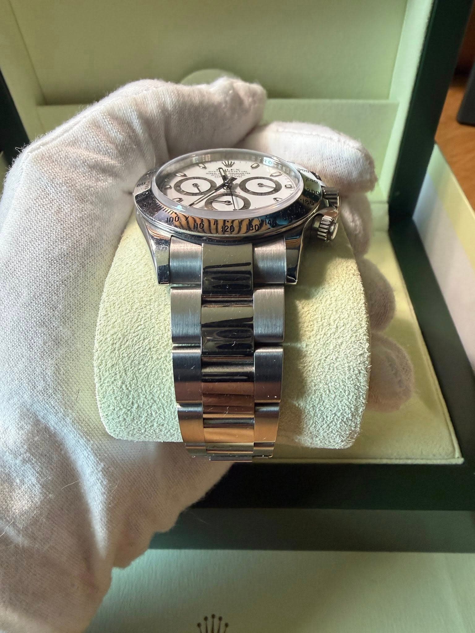 May be an image of wrist watch and text